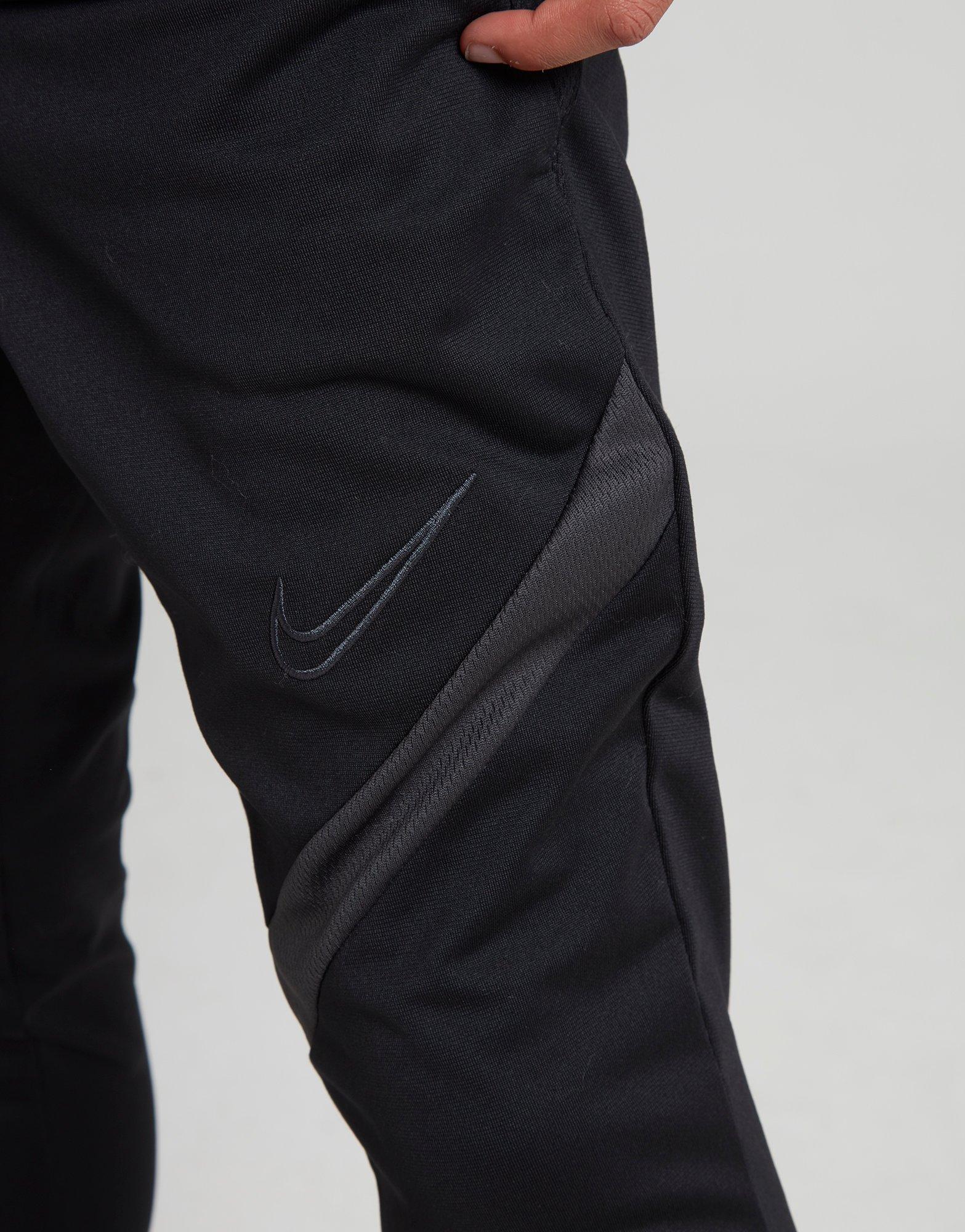 black nike tracksuit bottoms junior