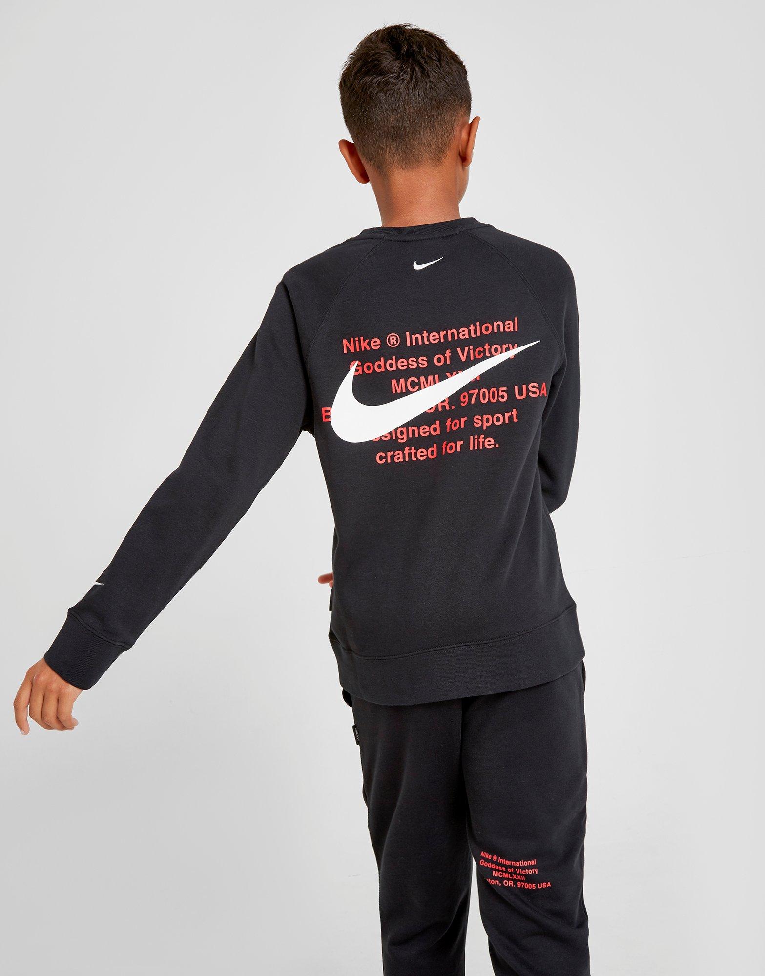 nike swoosh junior