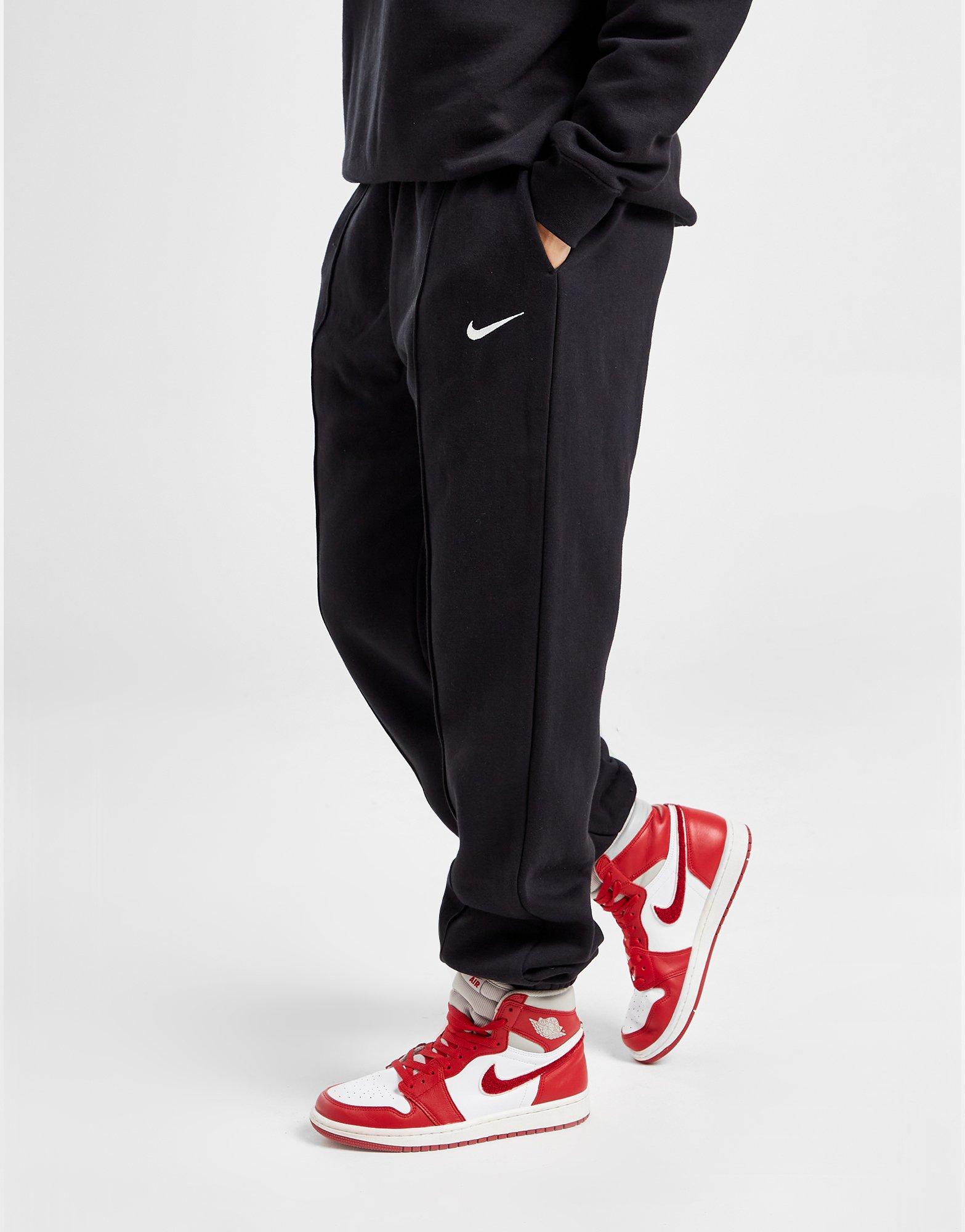 nike swoosh joggers black