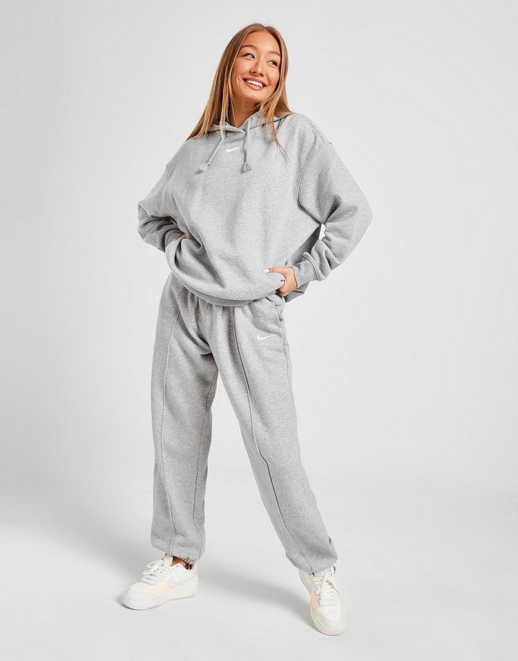 Shop den Nike Swoosh Fleece Jogginghose Damen in Grau