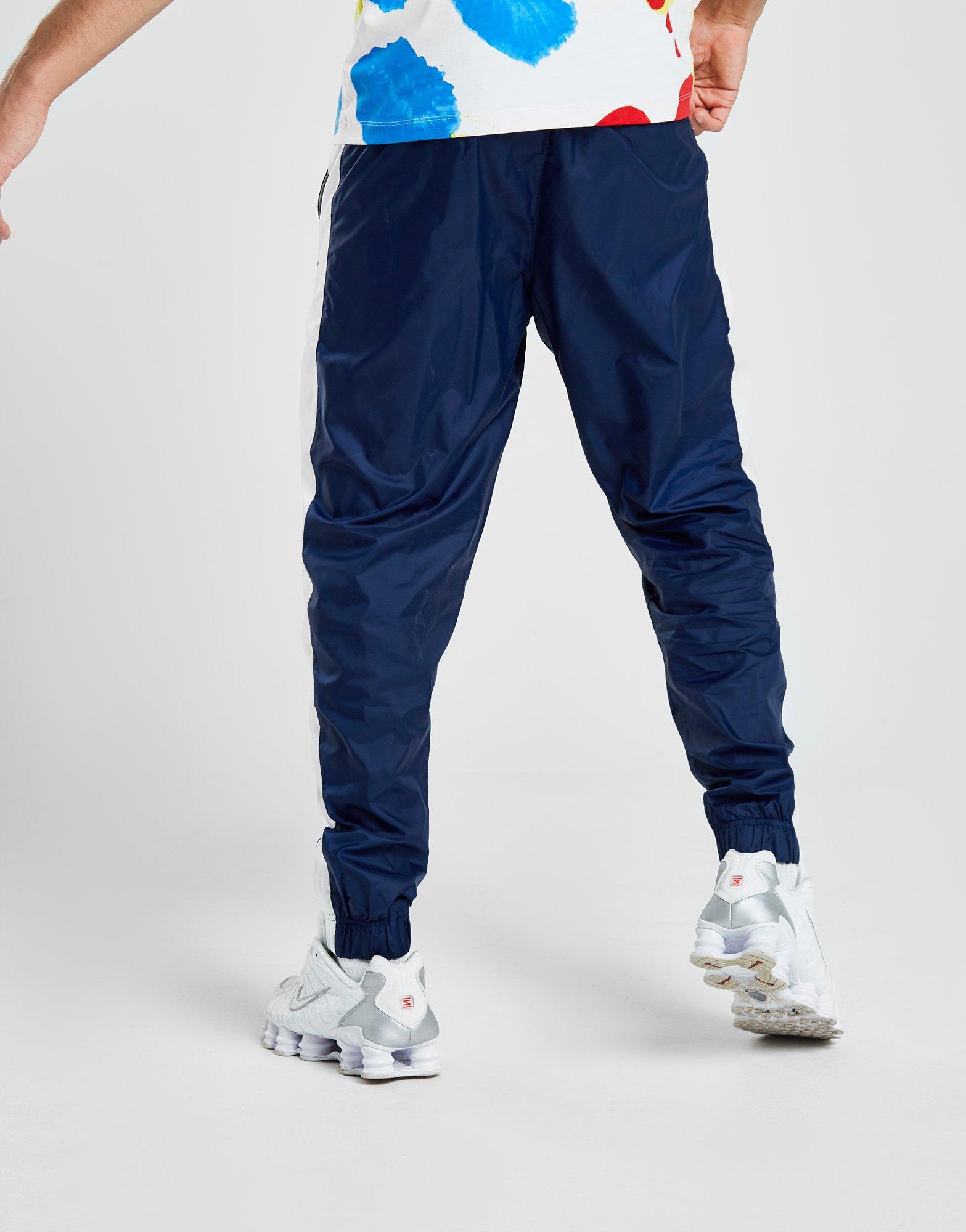 blue nike track pants