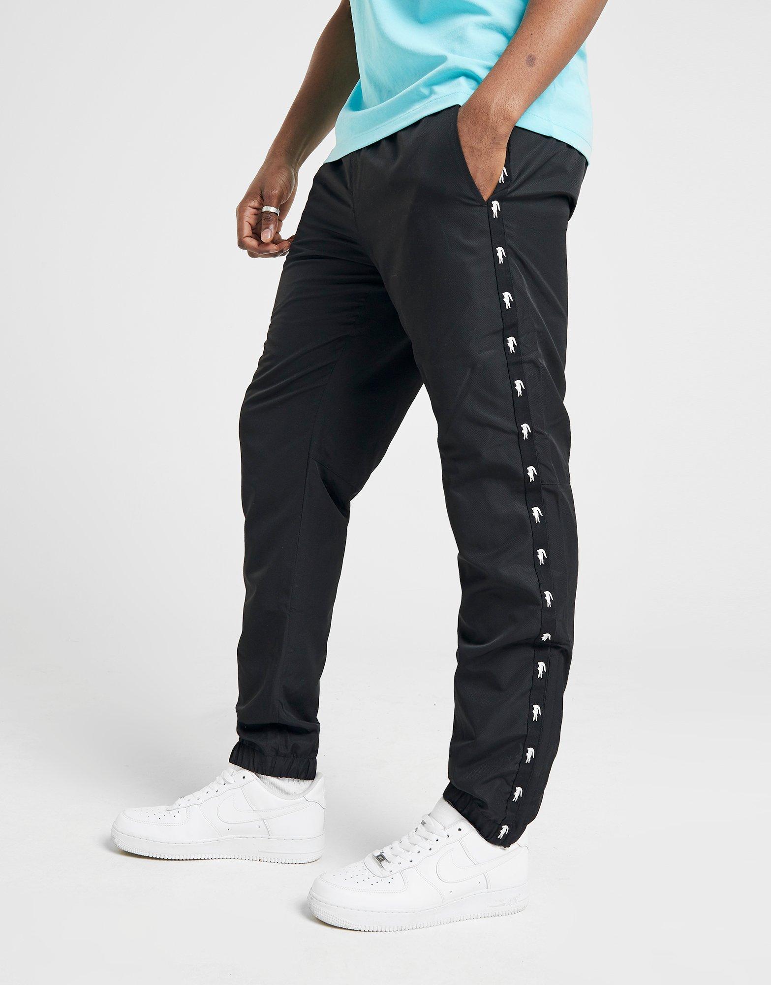 nike guppy track pants