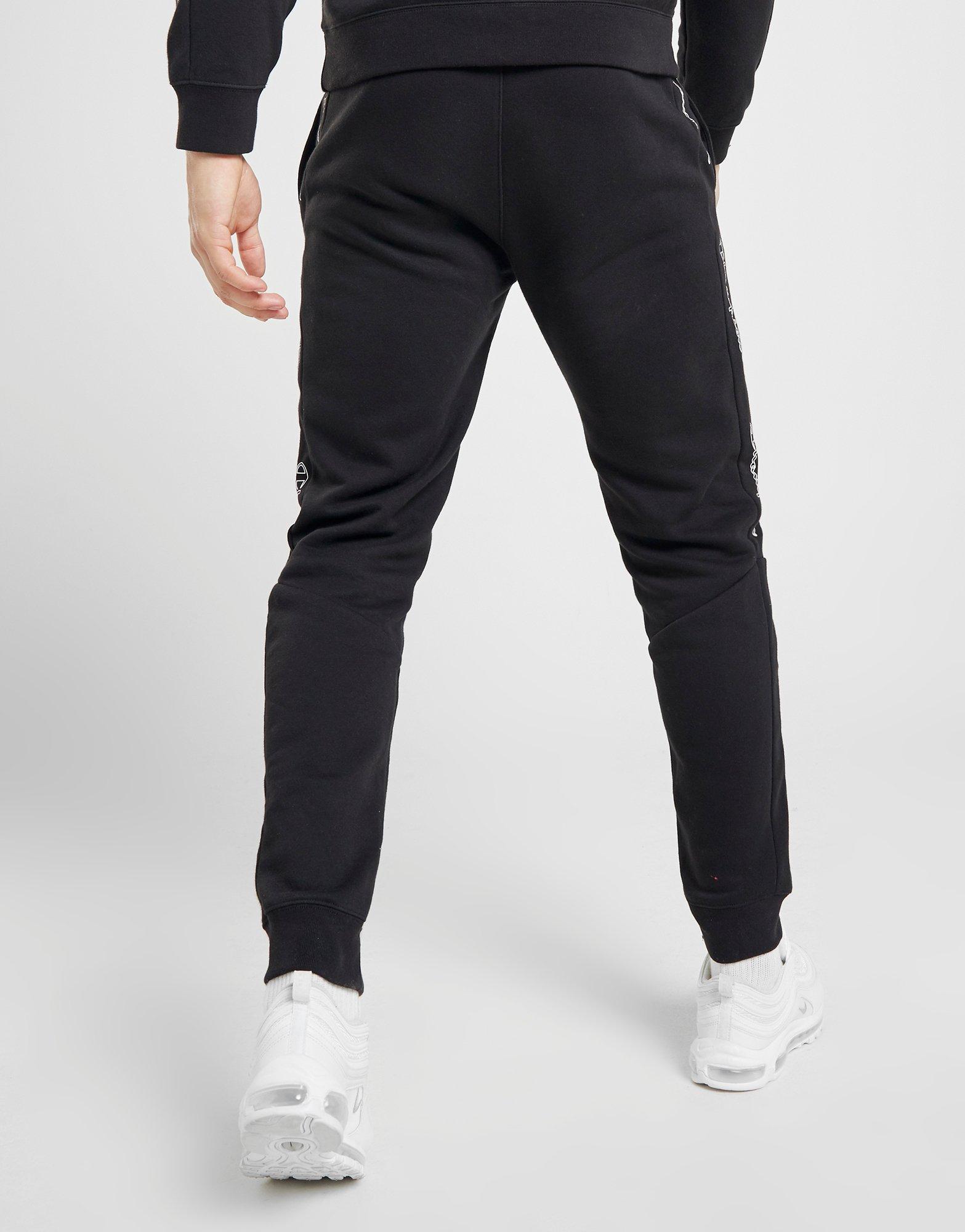 champion black and red taping track pants