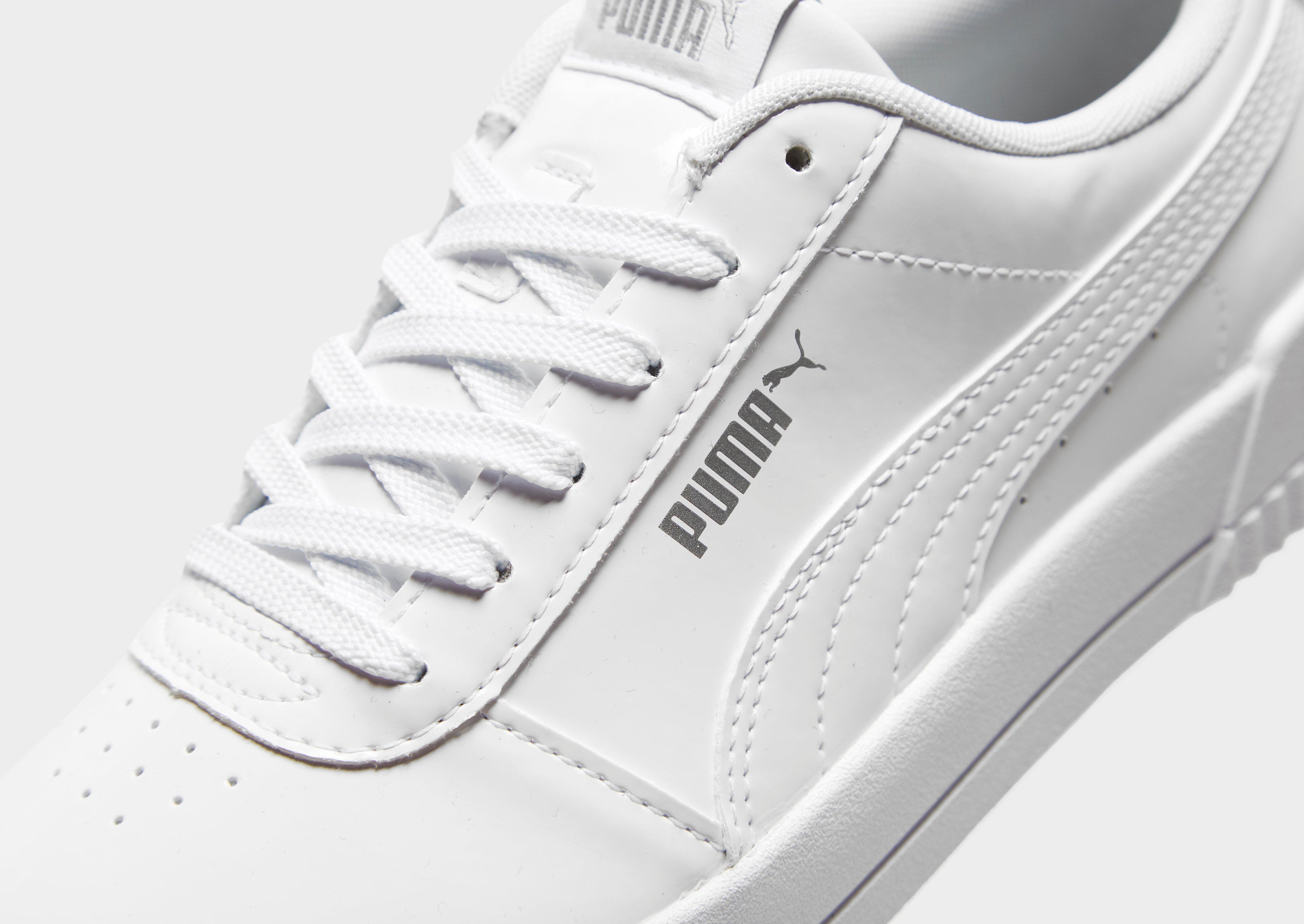 white puma trainers junior