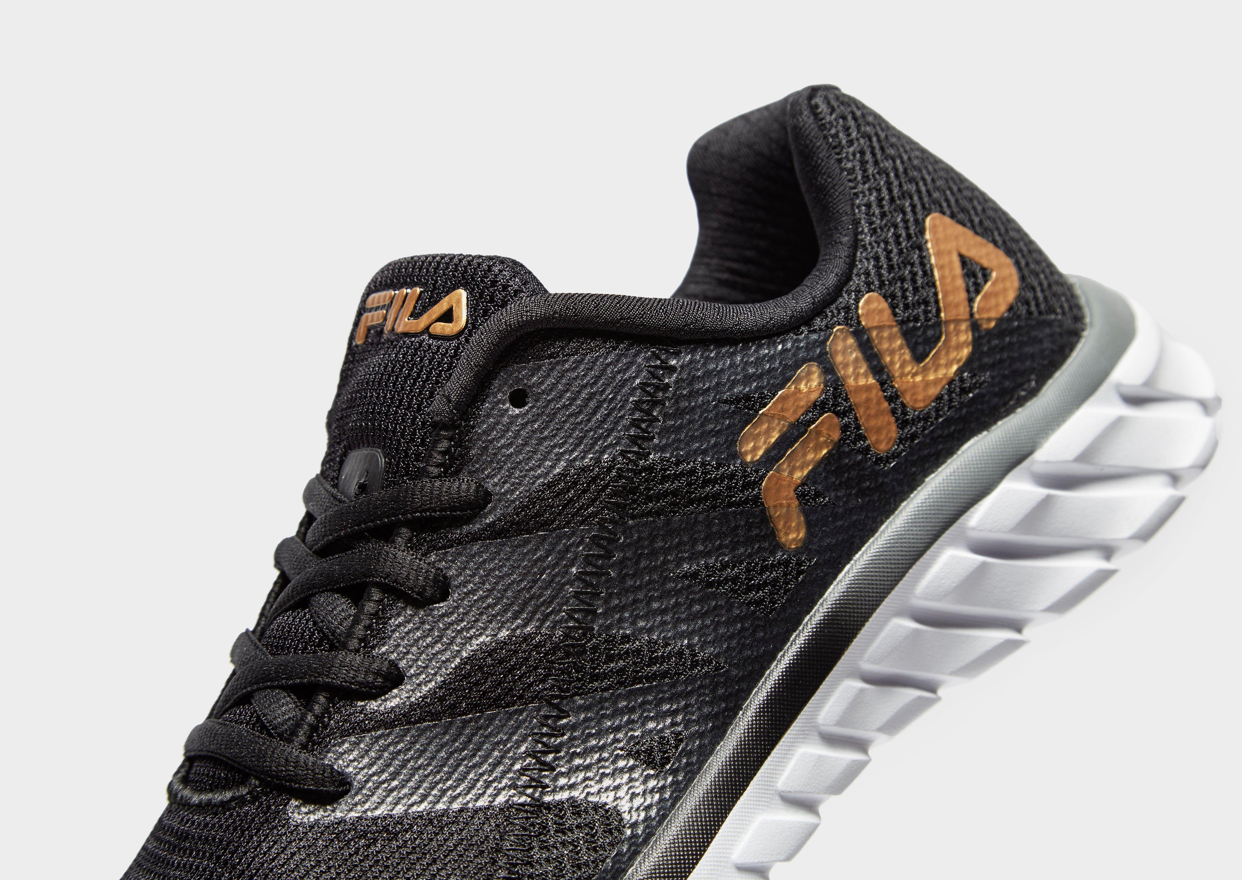 tuta nera e oro fila