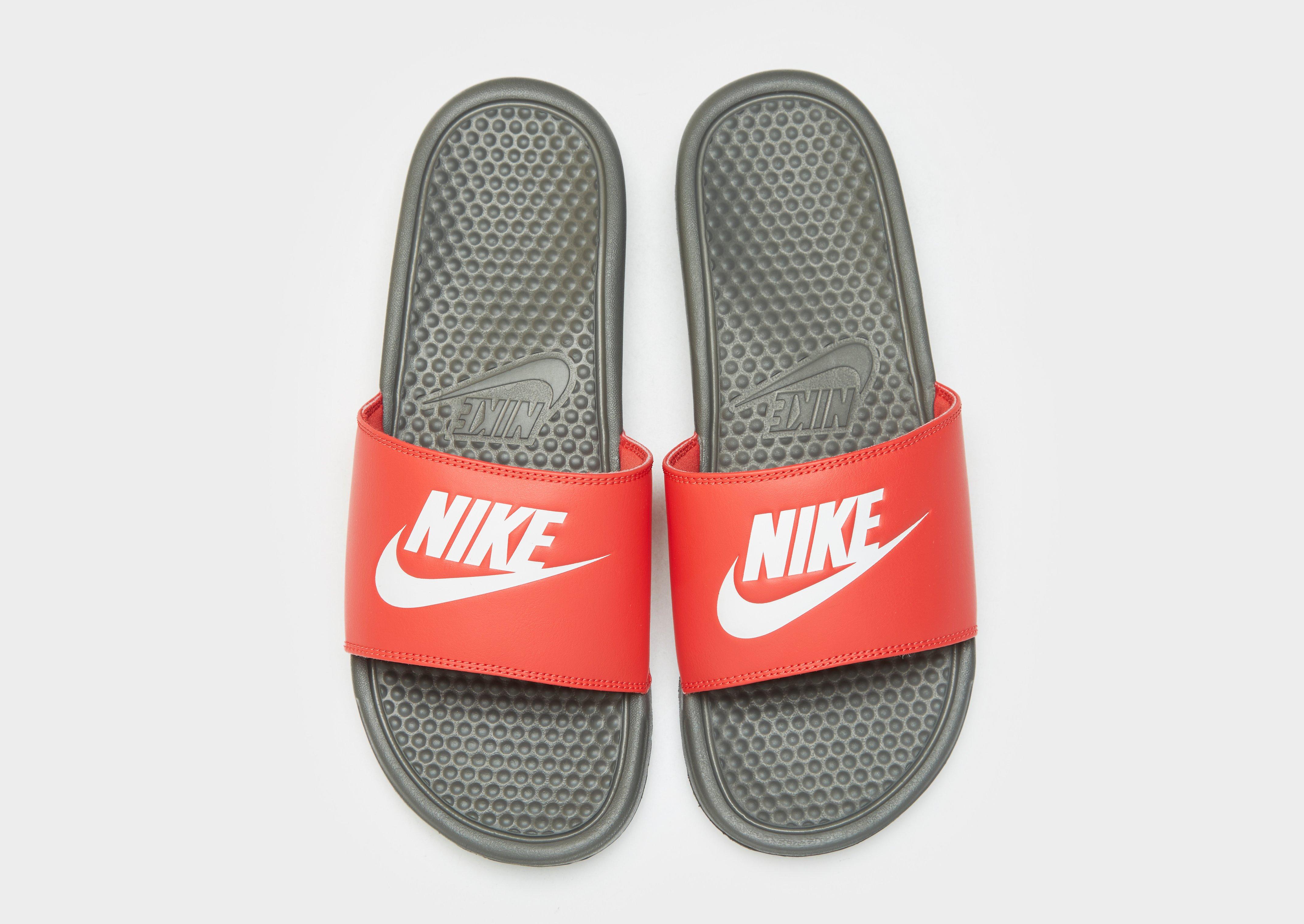 nike benassi slides orange