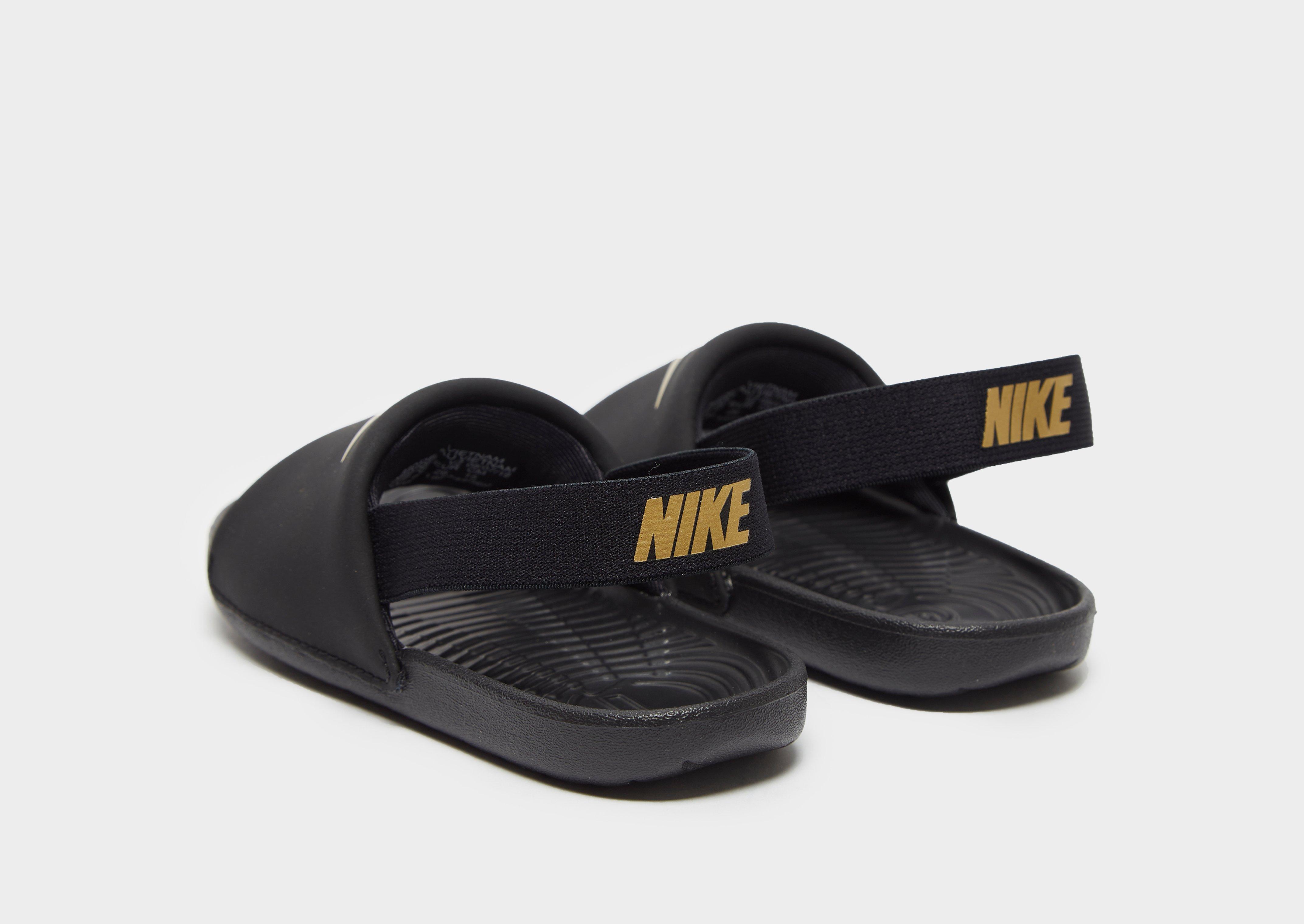 nike kawa slide black gold