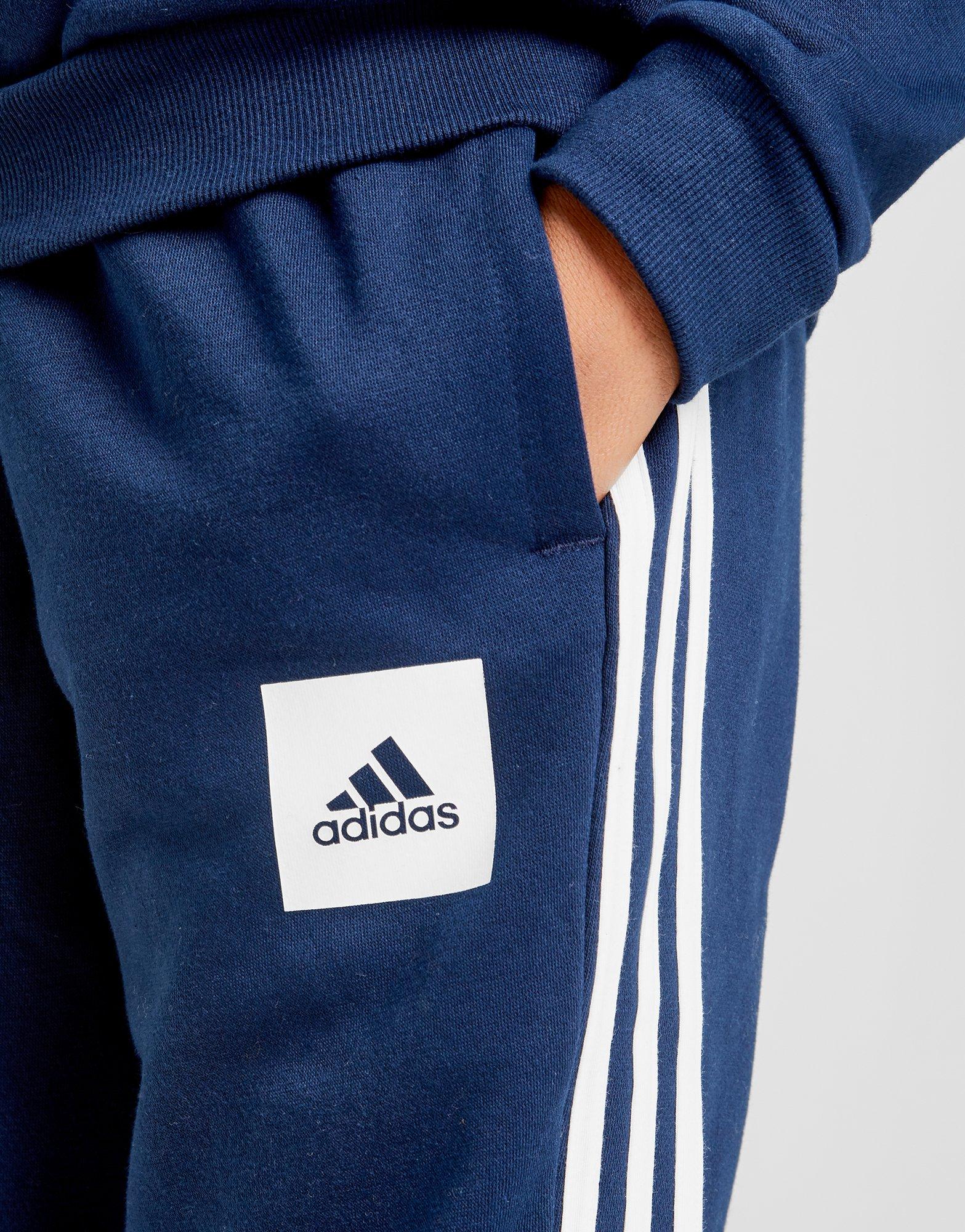 blue adidas tracksuit junior
