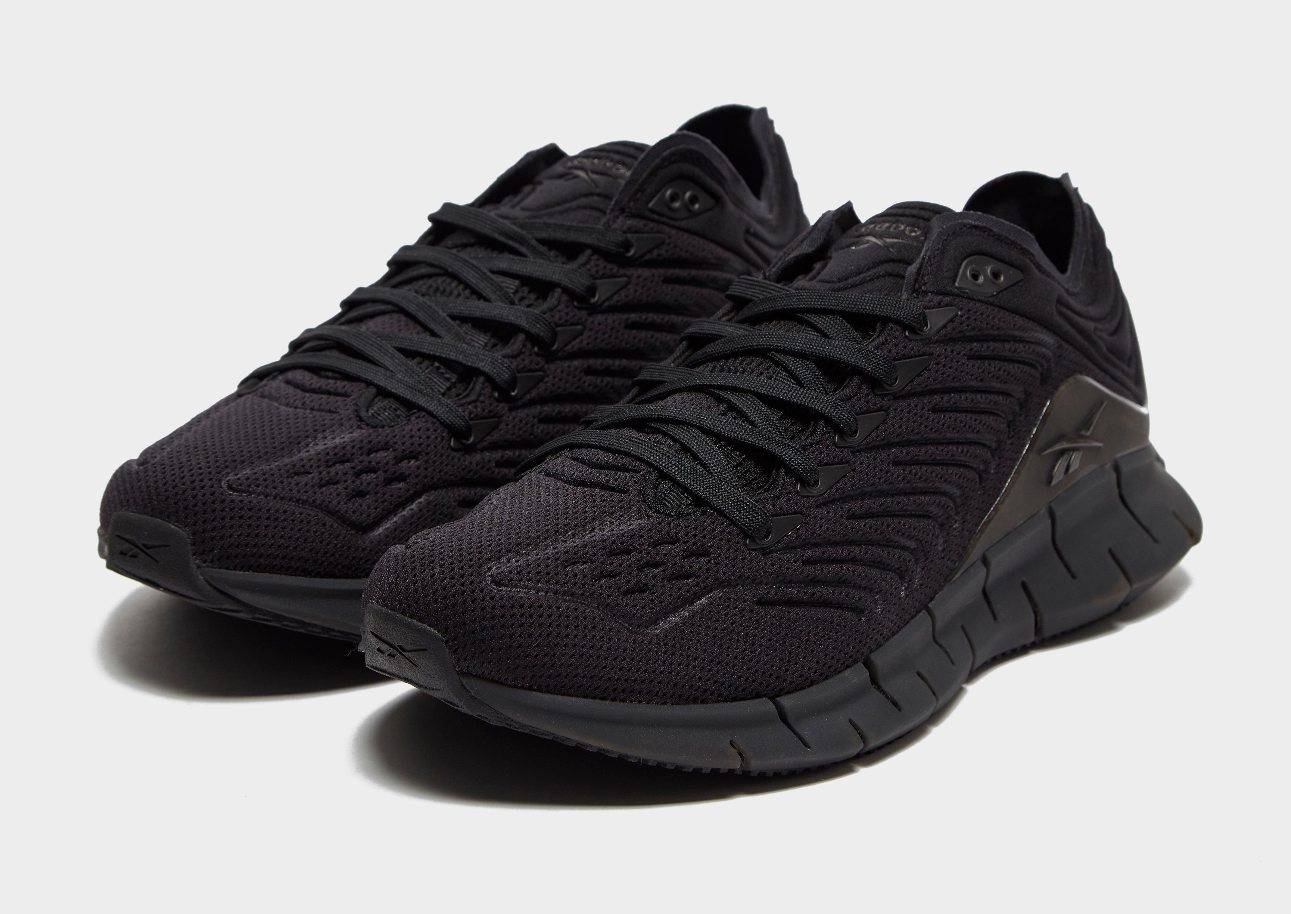 all black reebok zigs