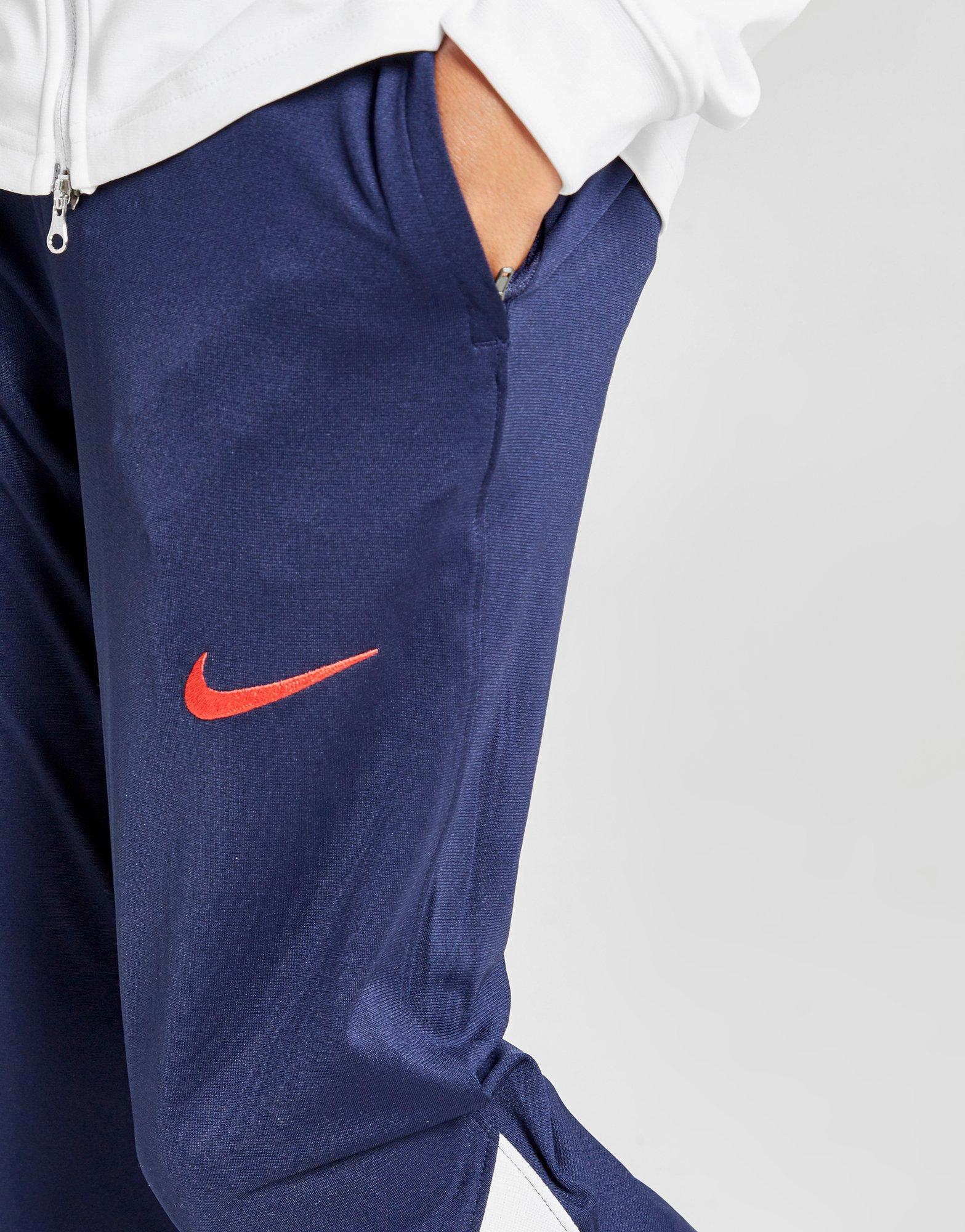 nike red tracksuit junior
