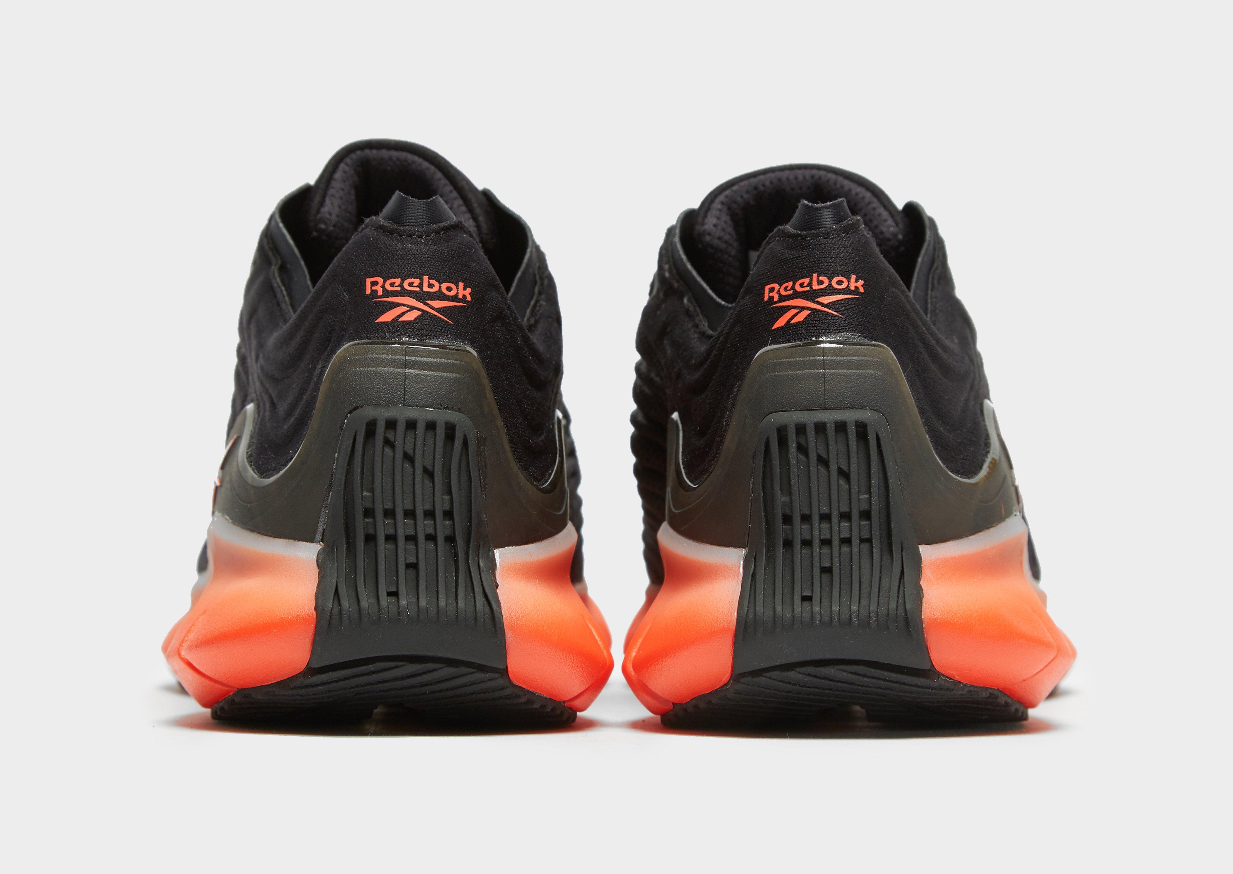pull reebok femme orange