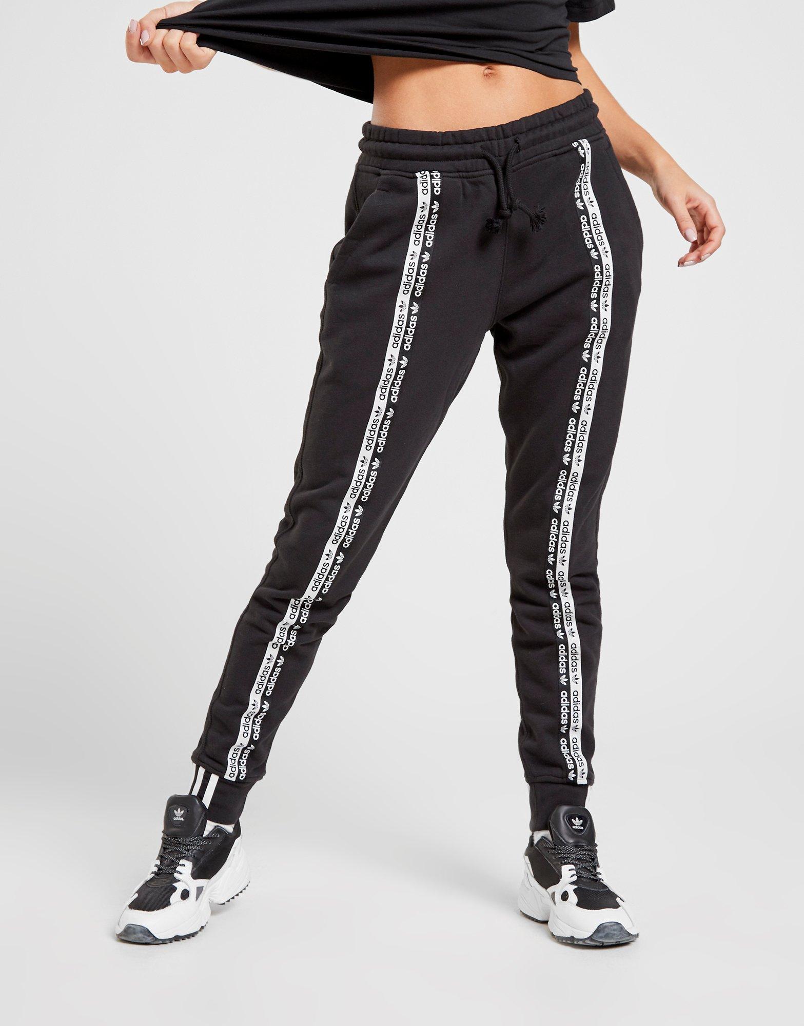 adidas originals ryv taping track pants in black