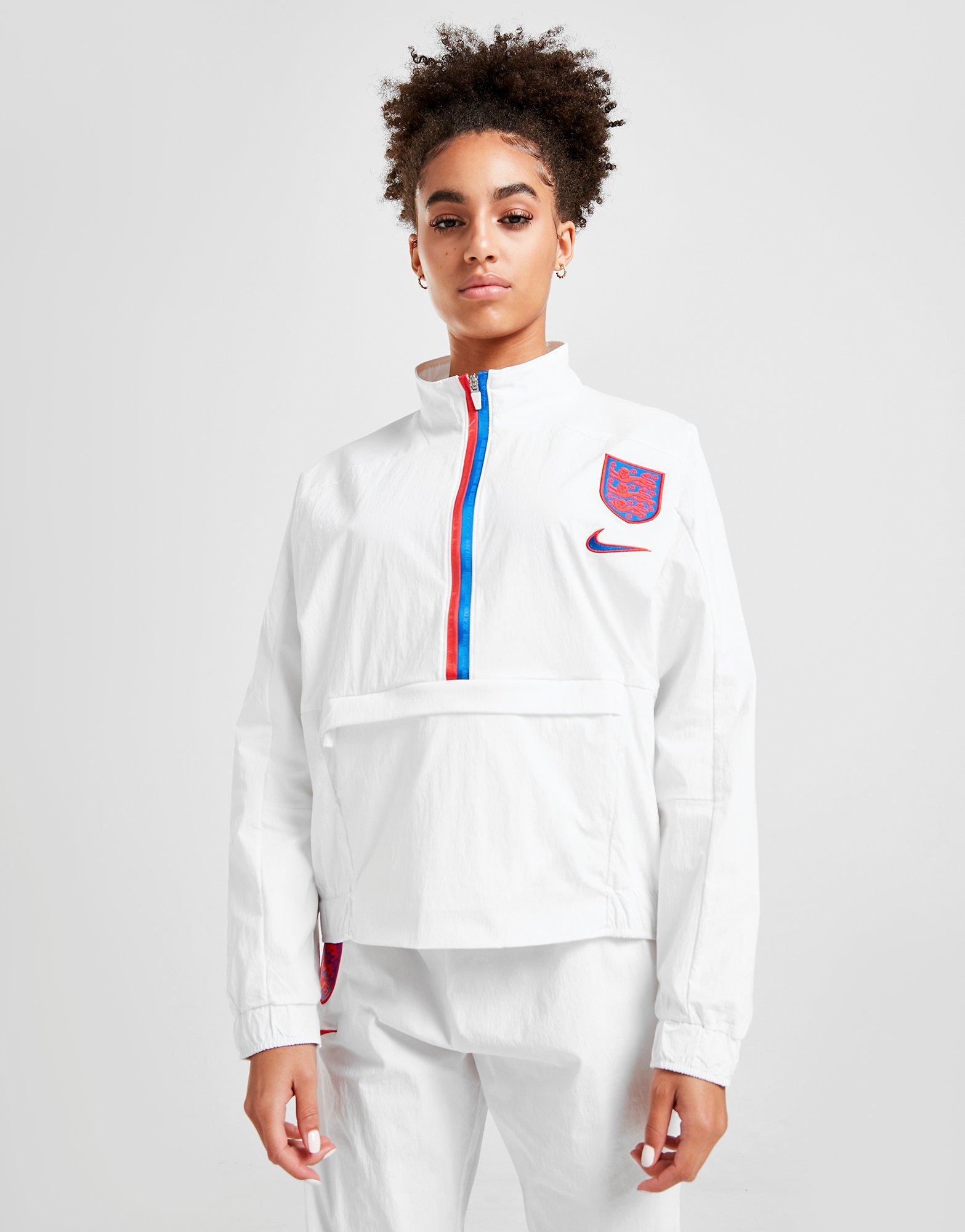 nike quarter zip track top