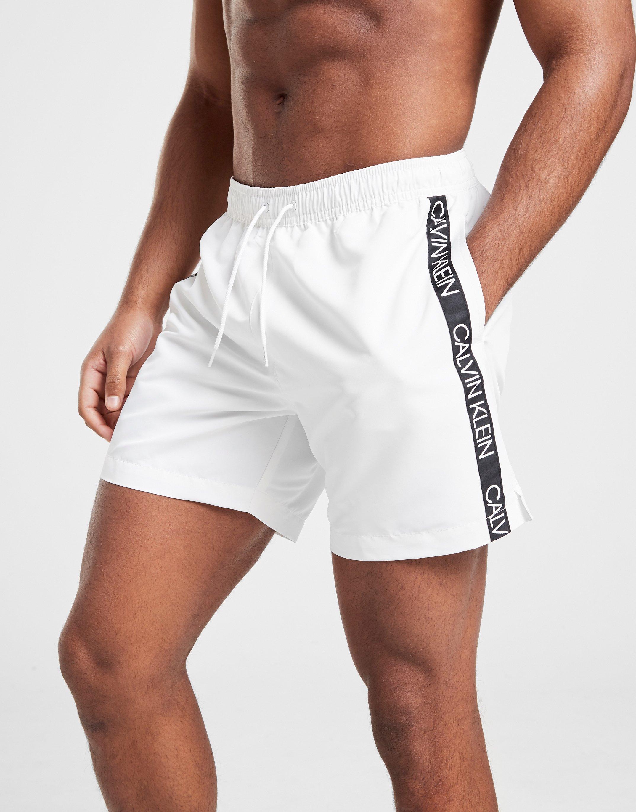 calvin klein logo tape swim shorts