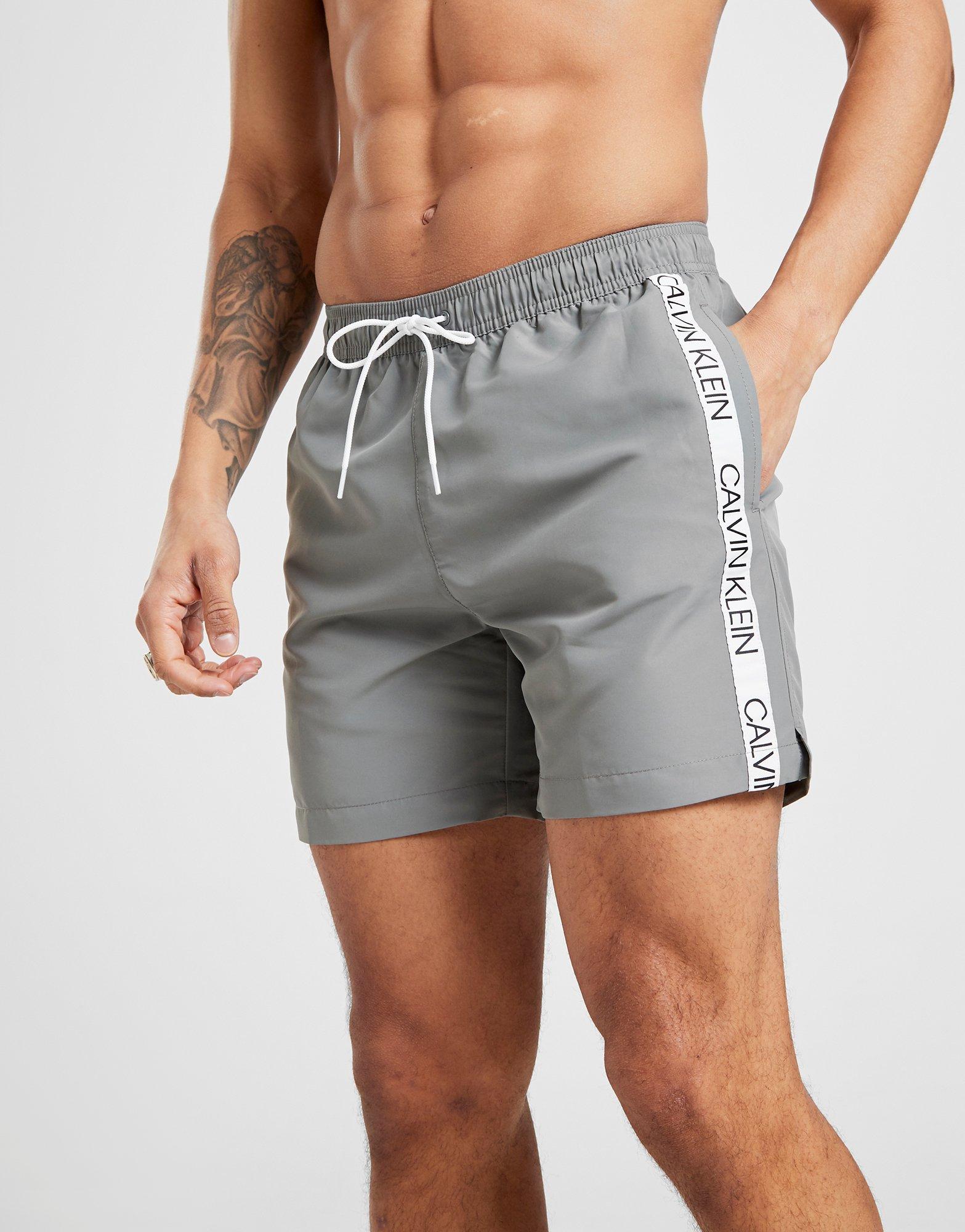 calvin klein logo tape swim shorts