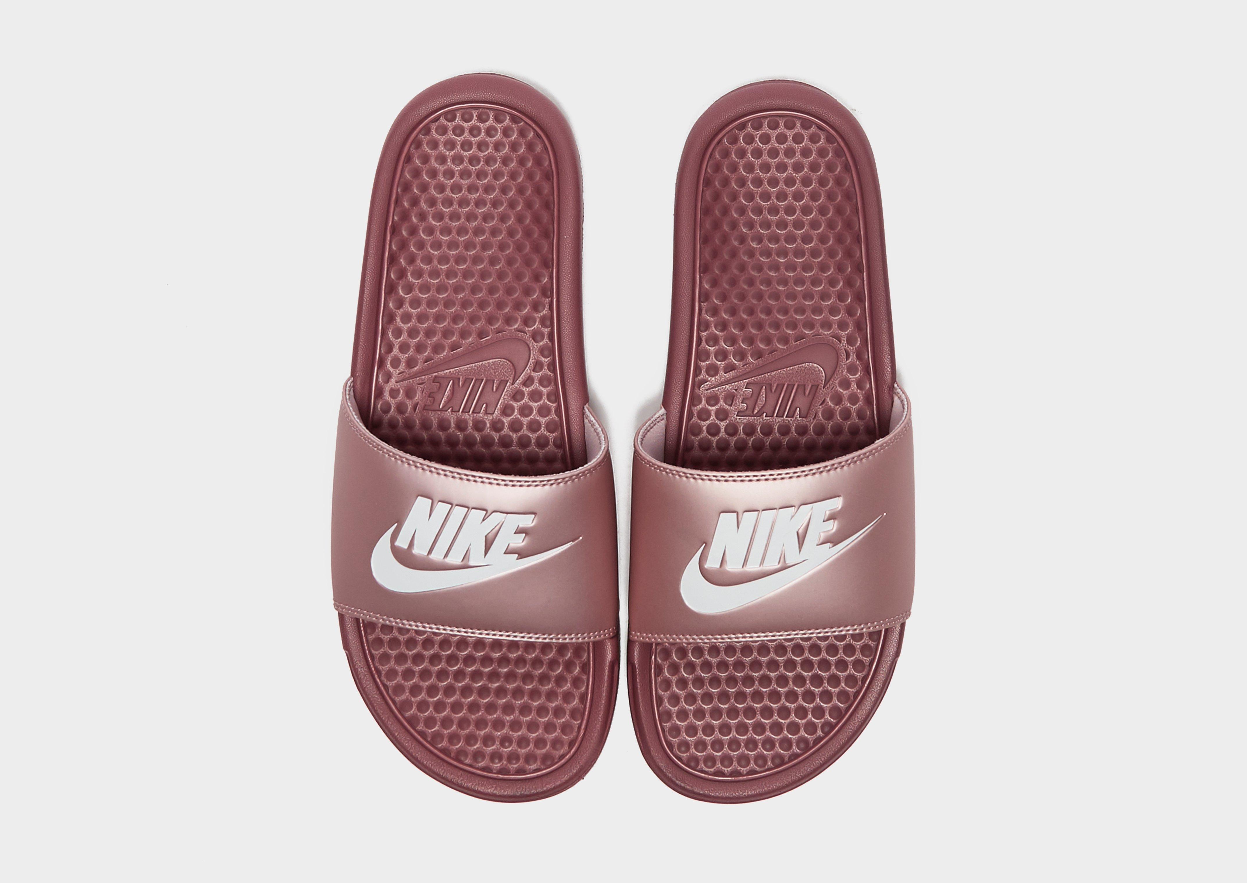 plum nike slides