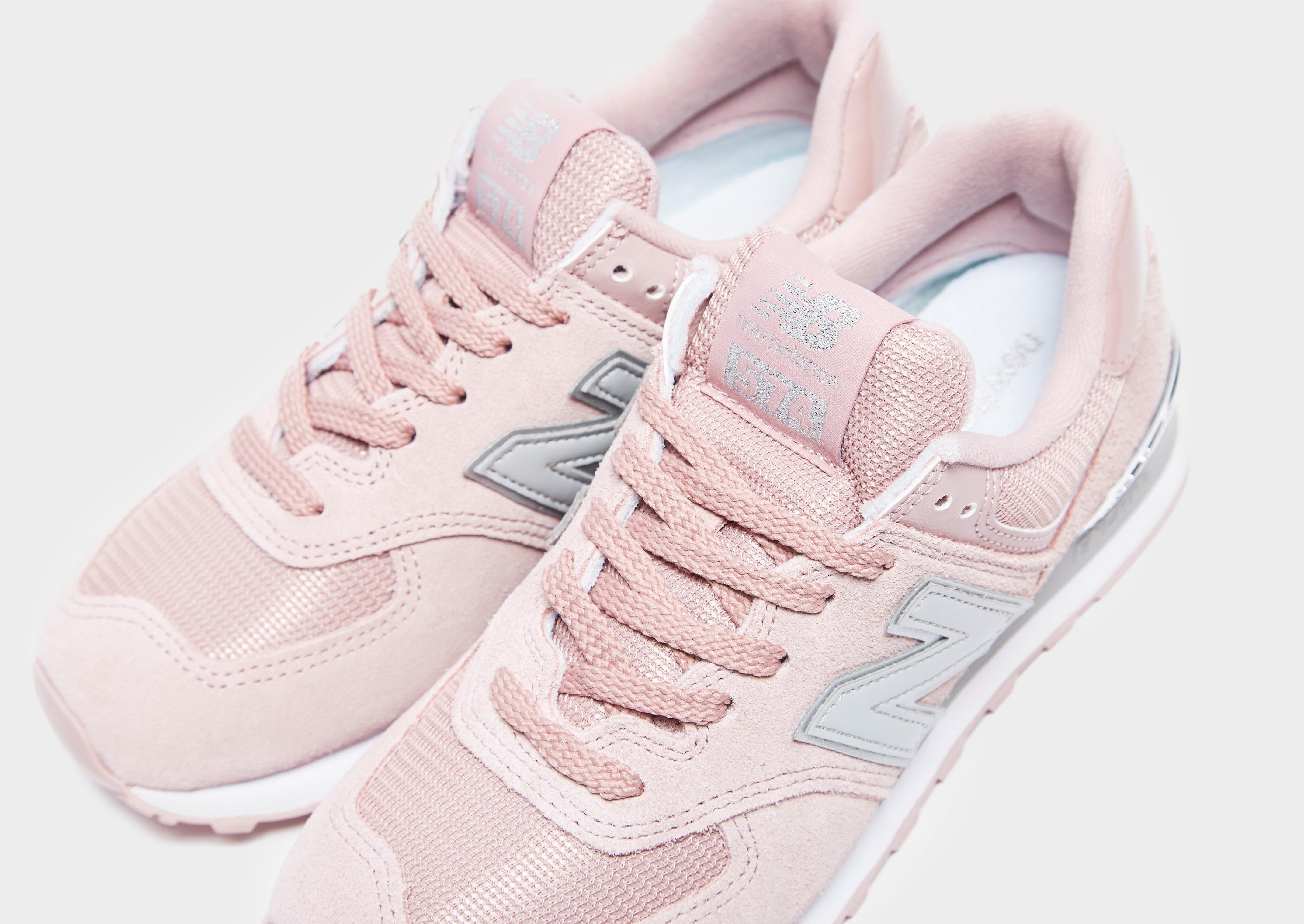 new balance 574 pink and silver trainers