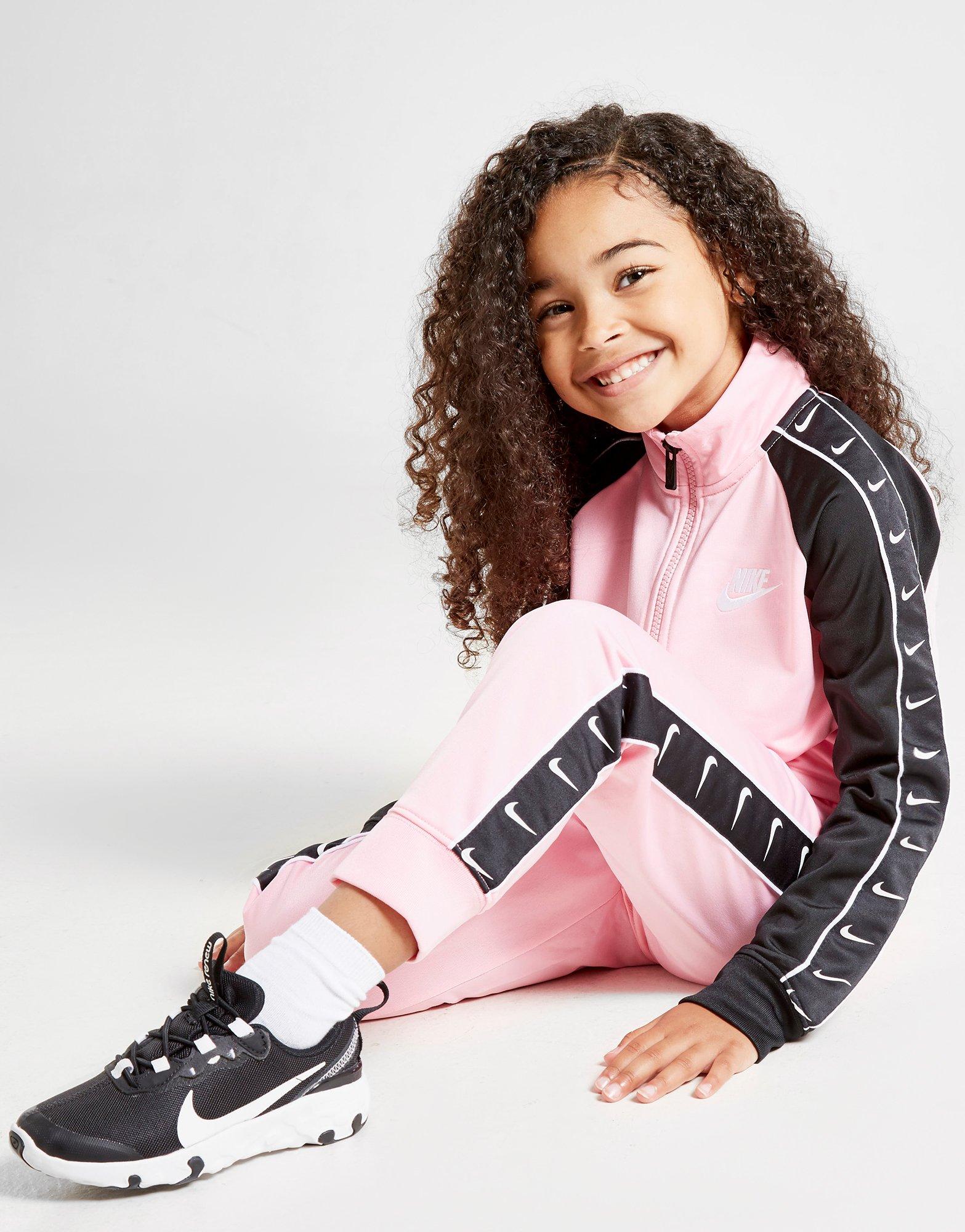 nike swoosh pink tracksuit