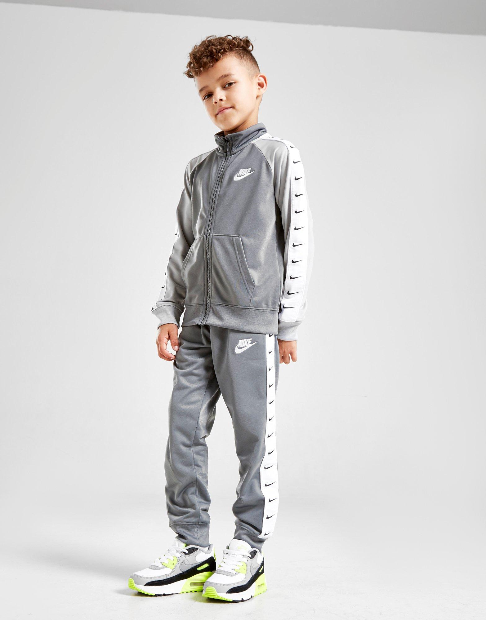 nike swoosh tape tracksuit