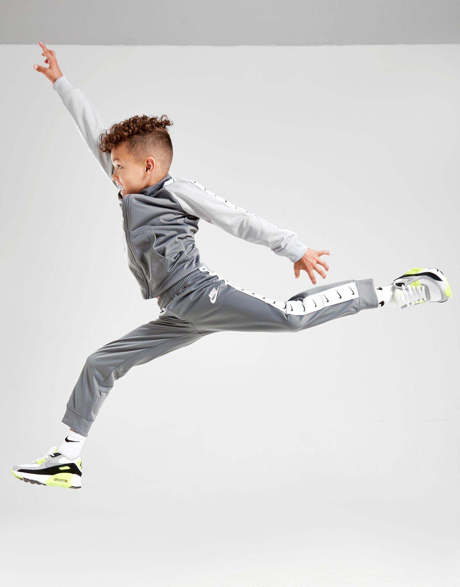 grey nike tape tracksuit