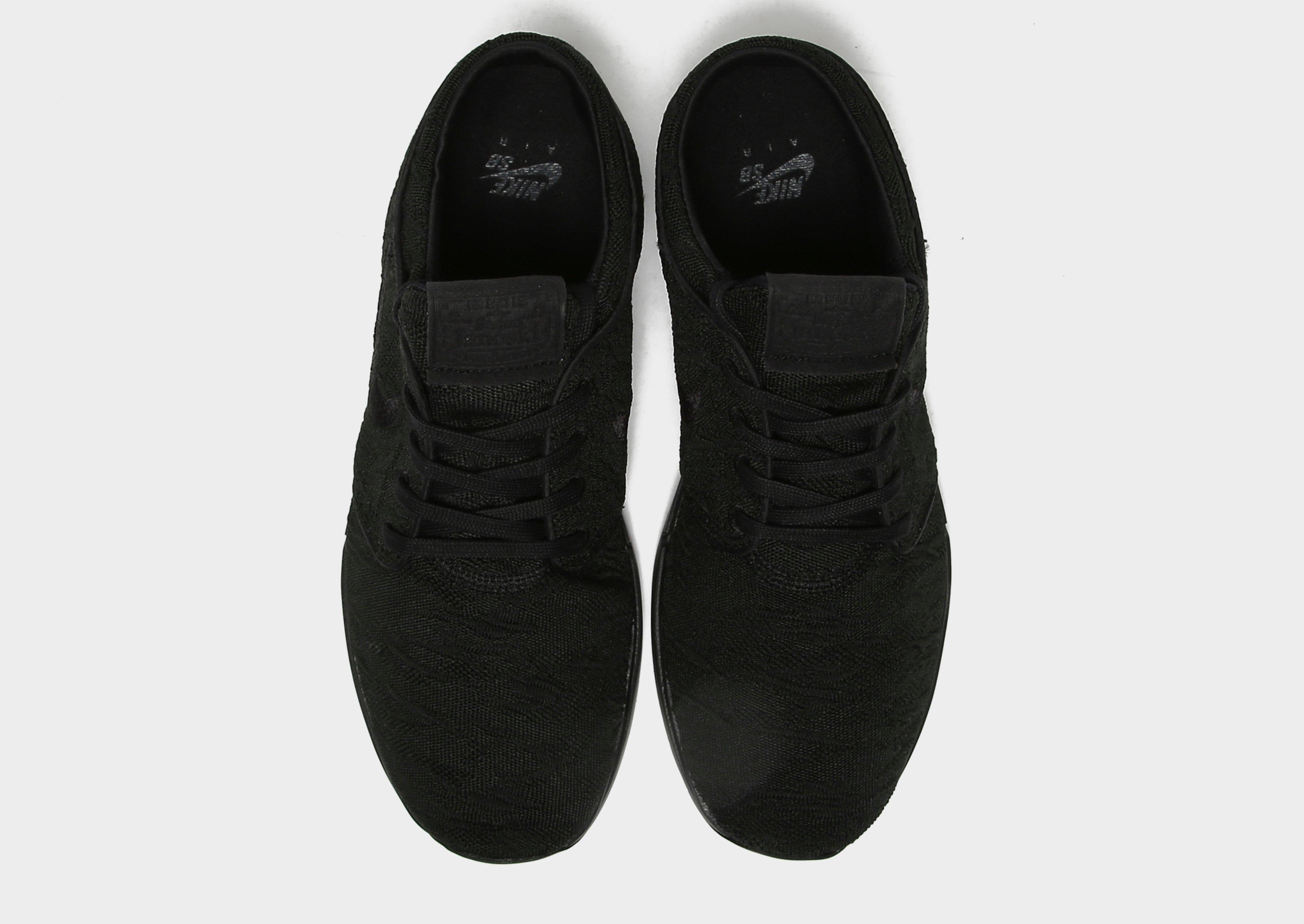 mens black nike janoski