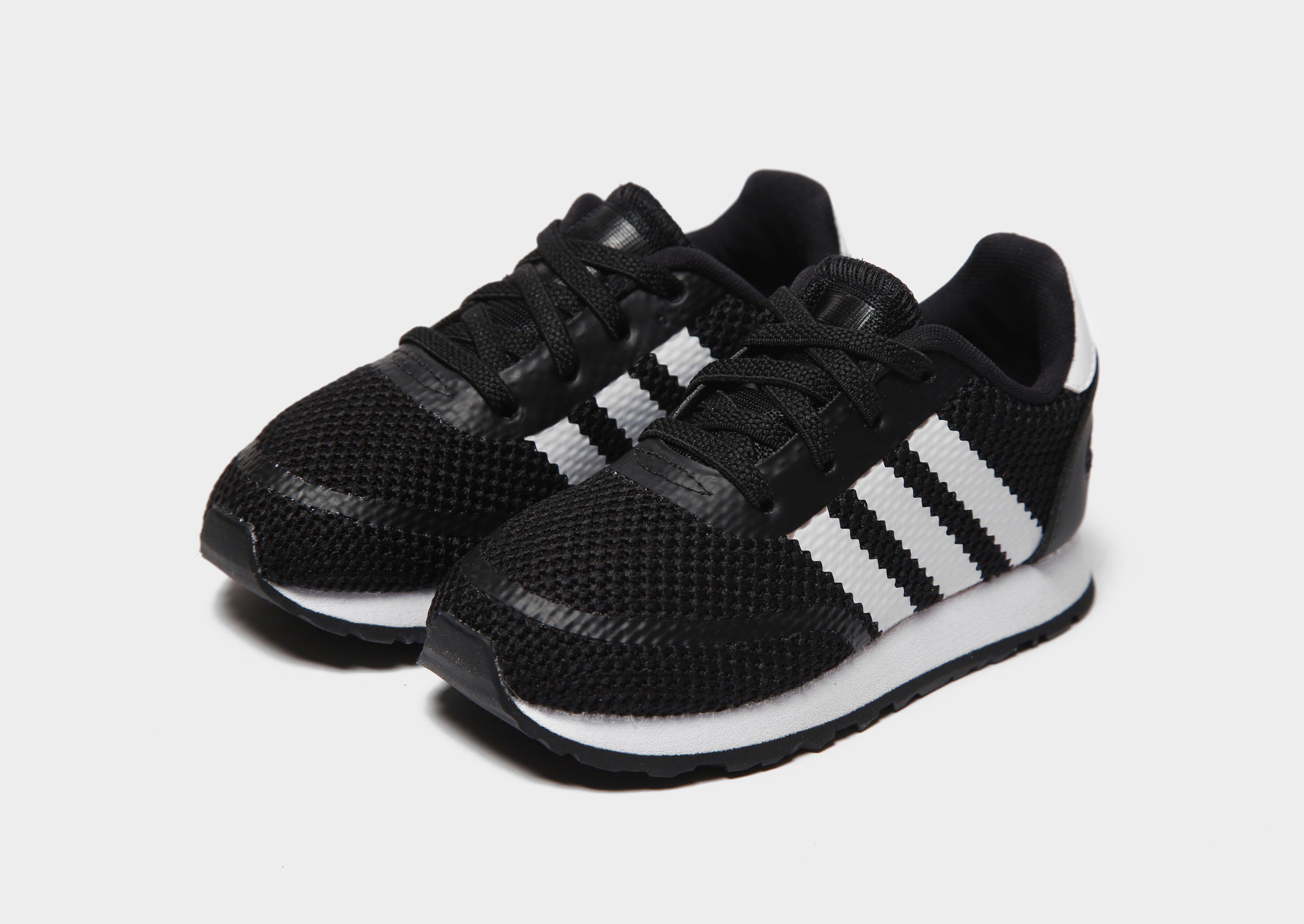 Adidas iniki noir outlet et blanc