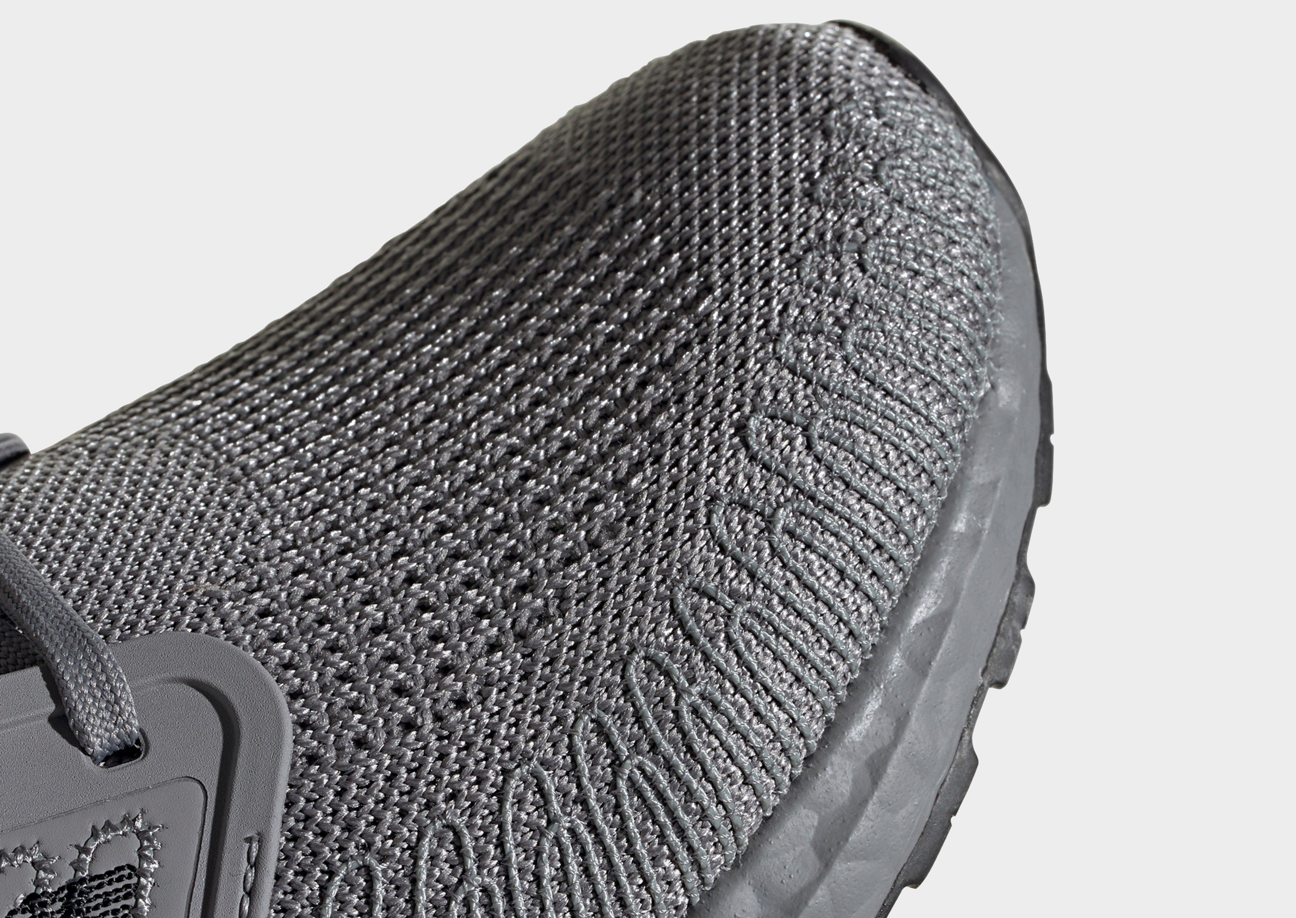 adidas ultra boost bianche con strisce argento