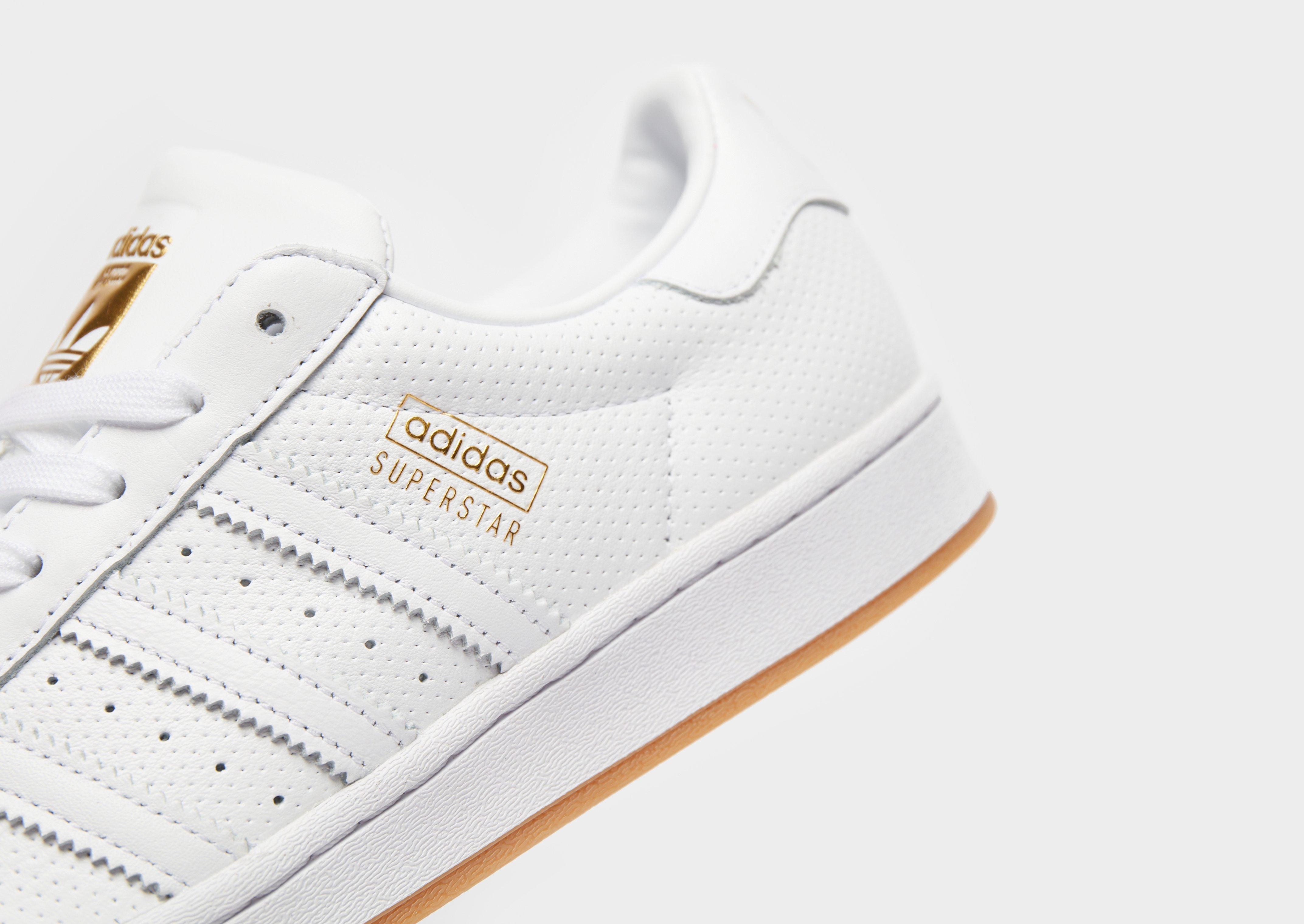 adidas superstar douradas