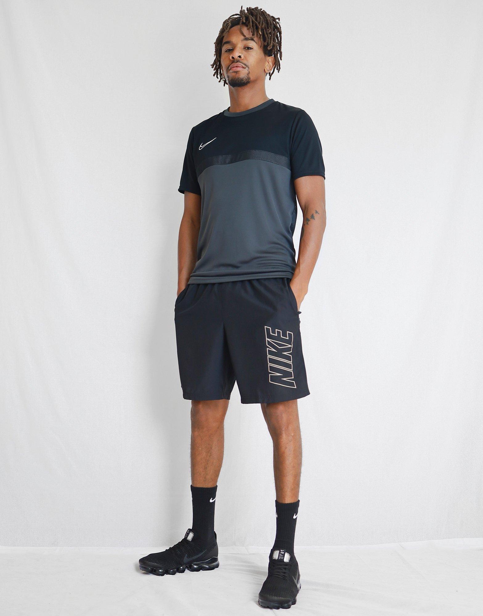 nike woven logo shorts in black