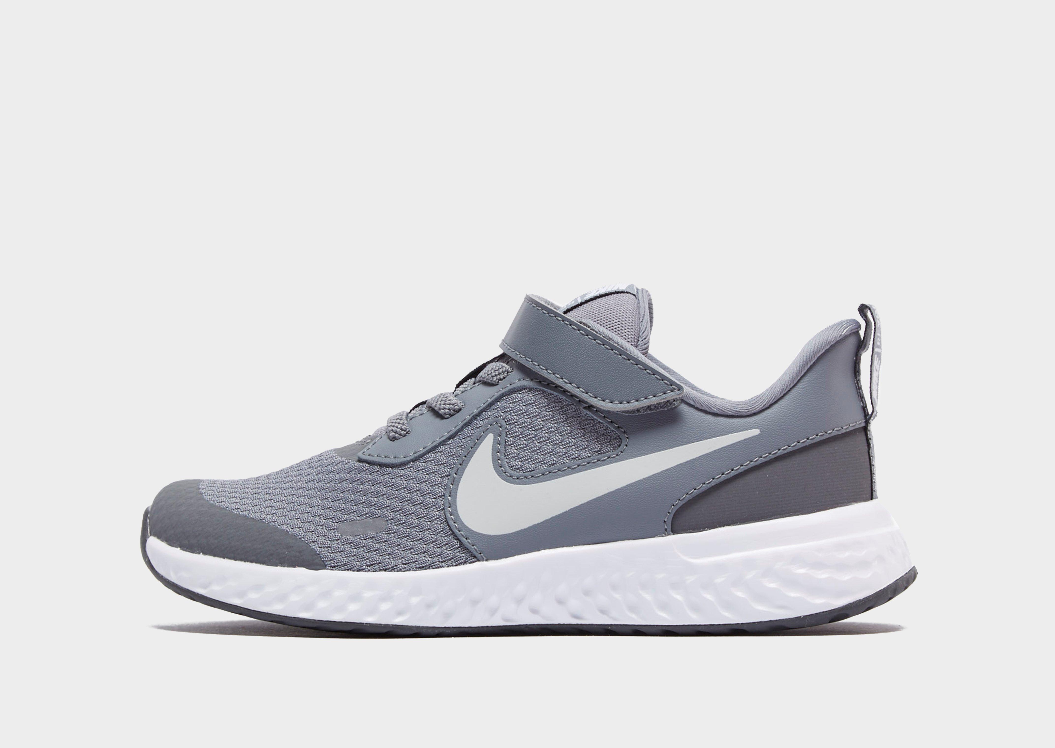 grey nike trainers kids