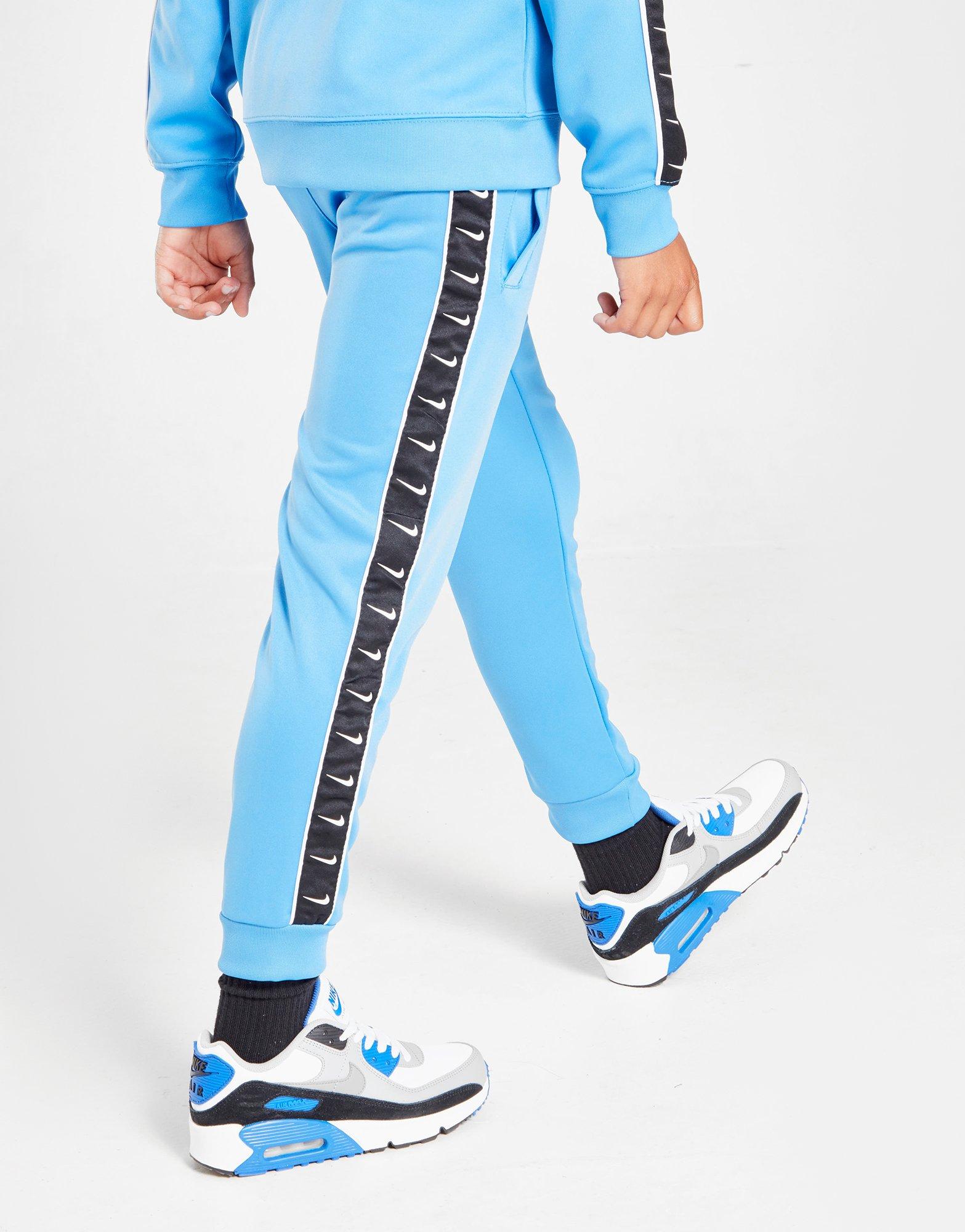 nike tape poly track pants junior