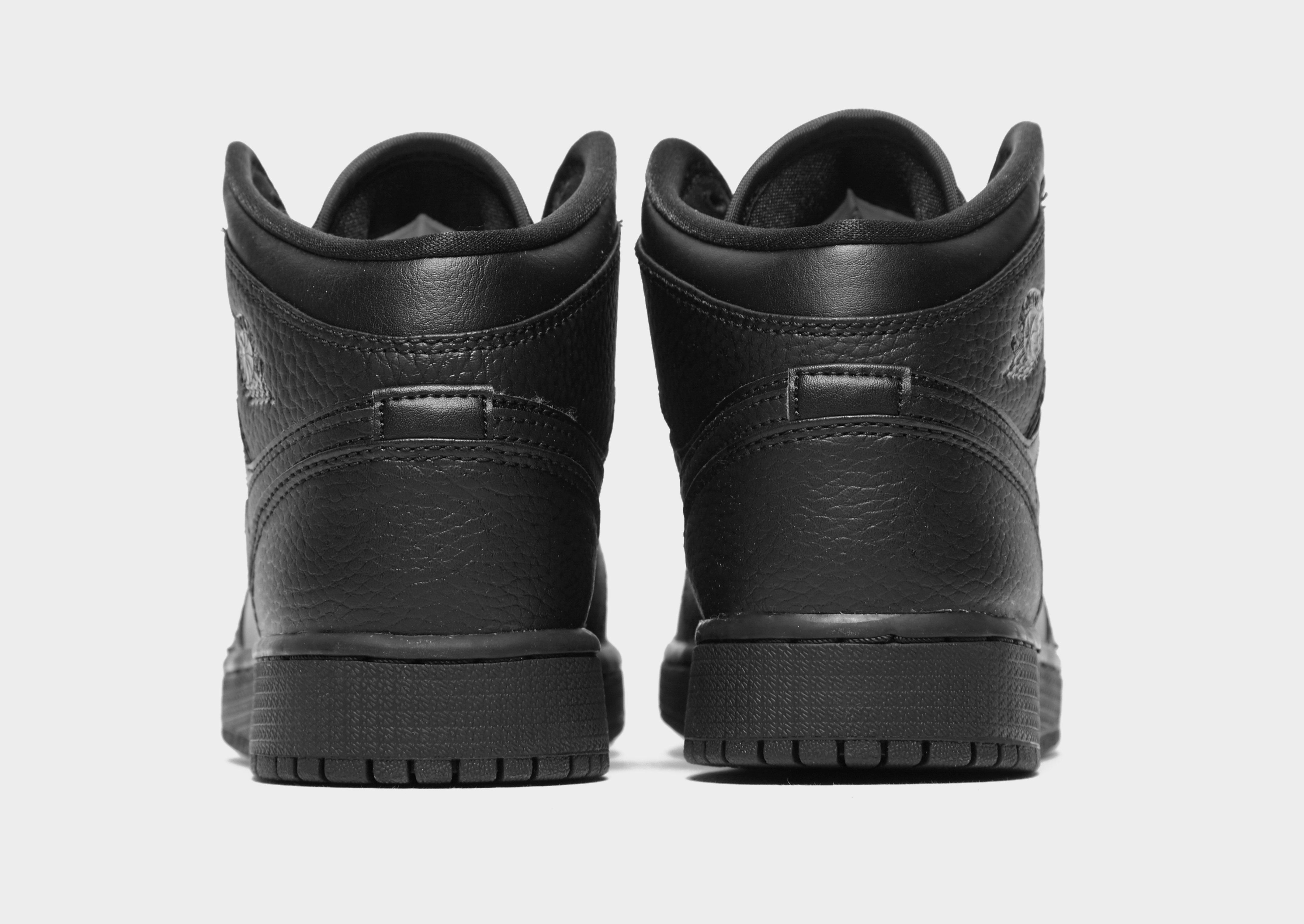 jordan air 1 mid junior black and white