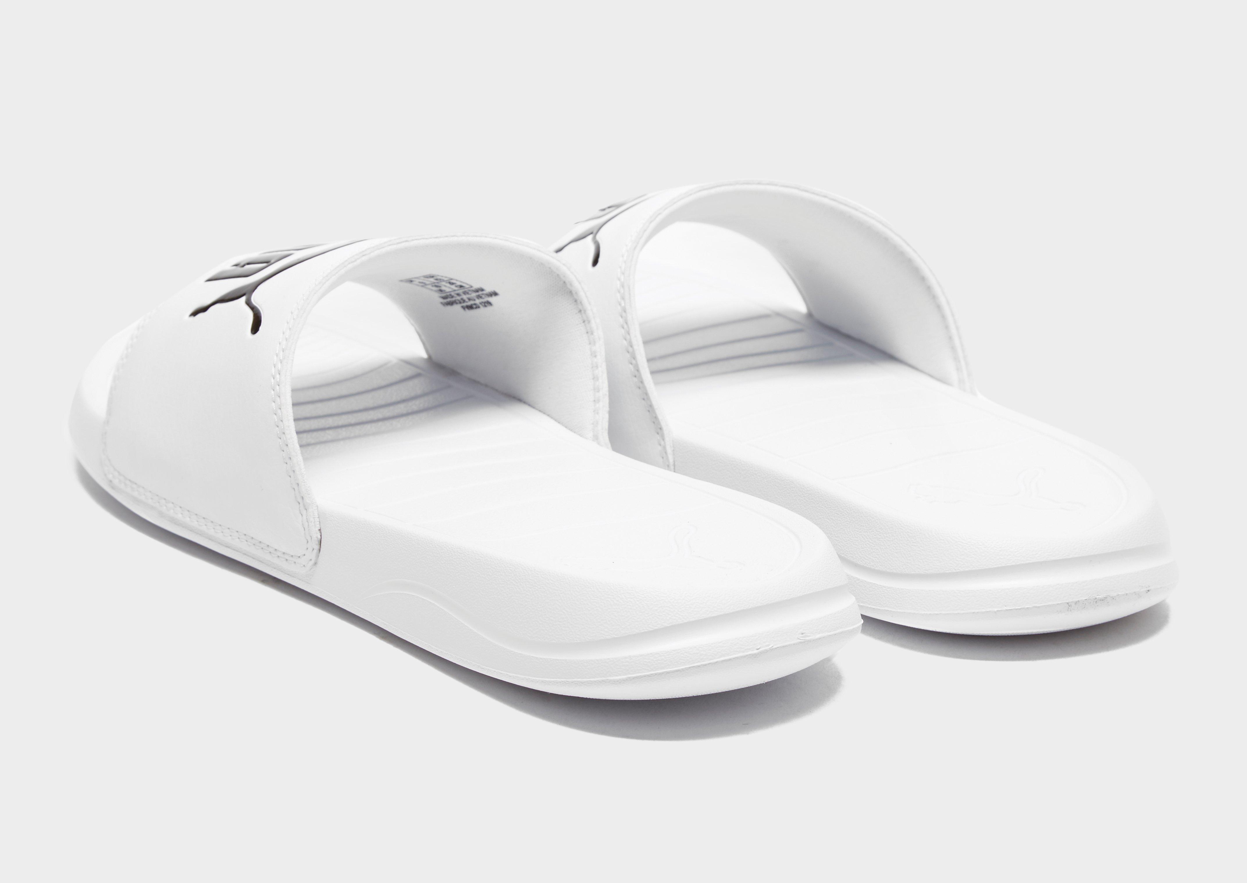 white puma slides