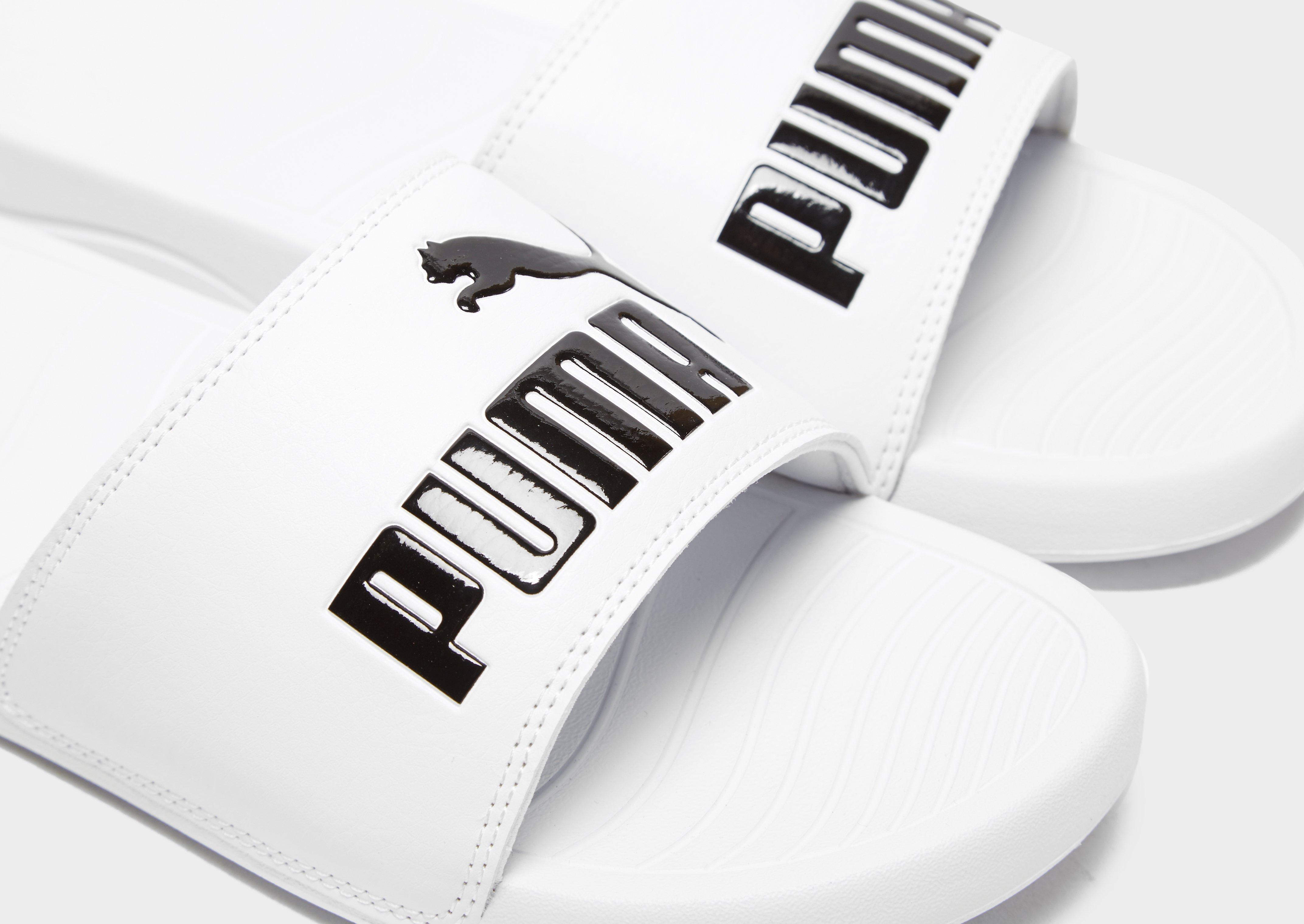 white puma slides