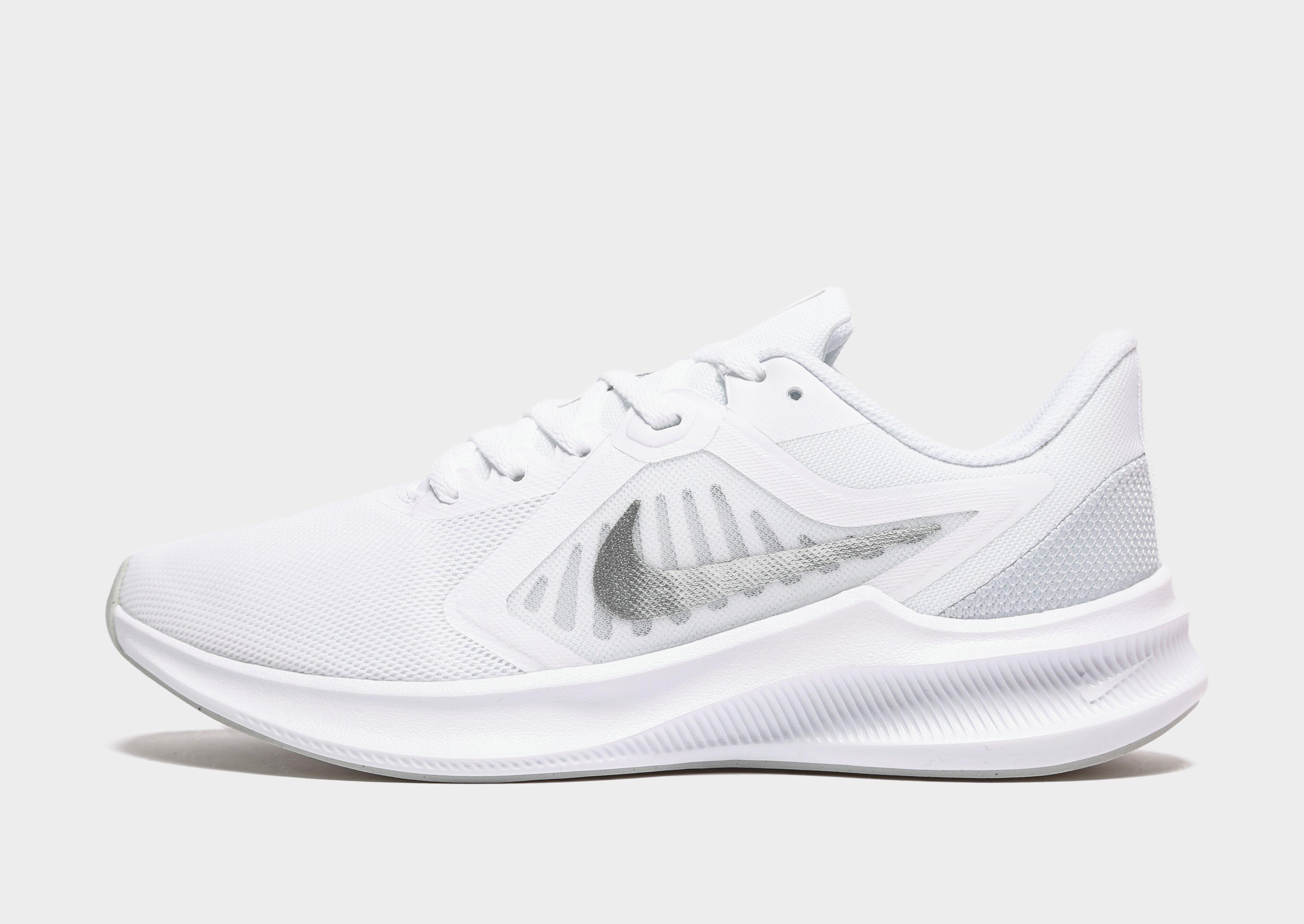 white nike downshifter