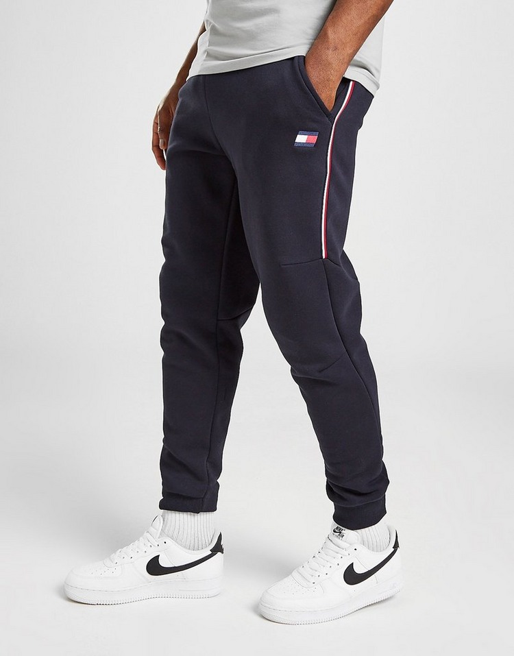 Buy Blue Tommy Hilfiger Tri Tape Track Pants JD Sports JD Sports