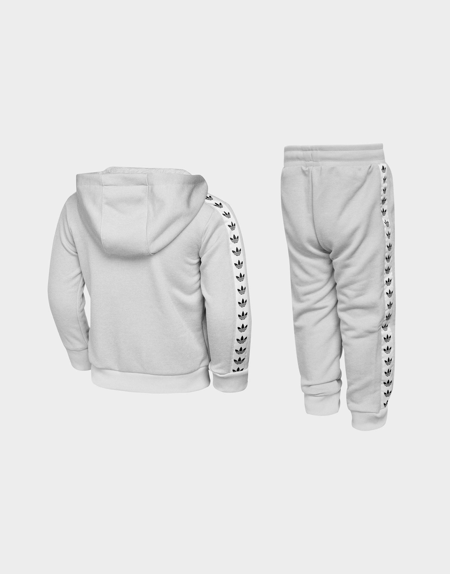 grey and white adidas tracksuit