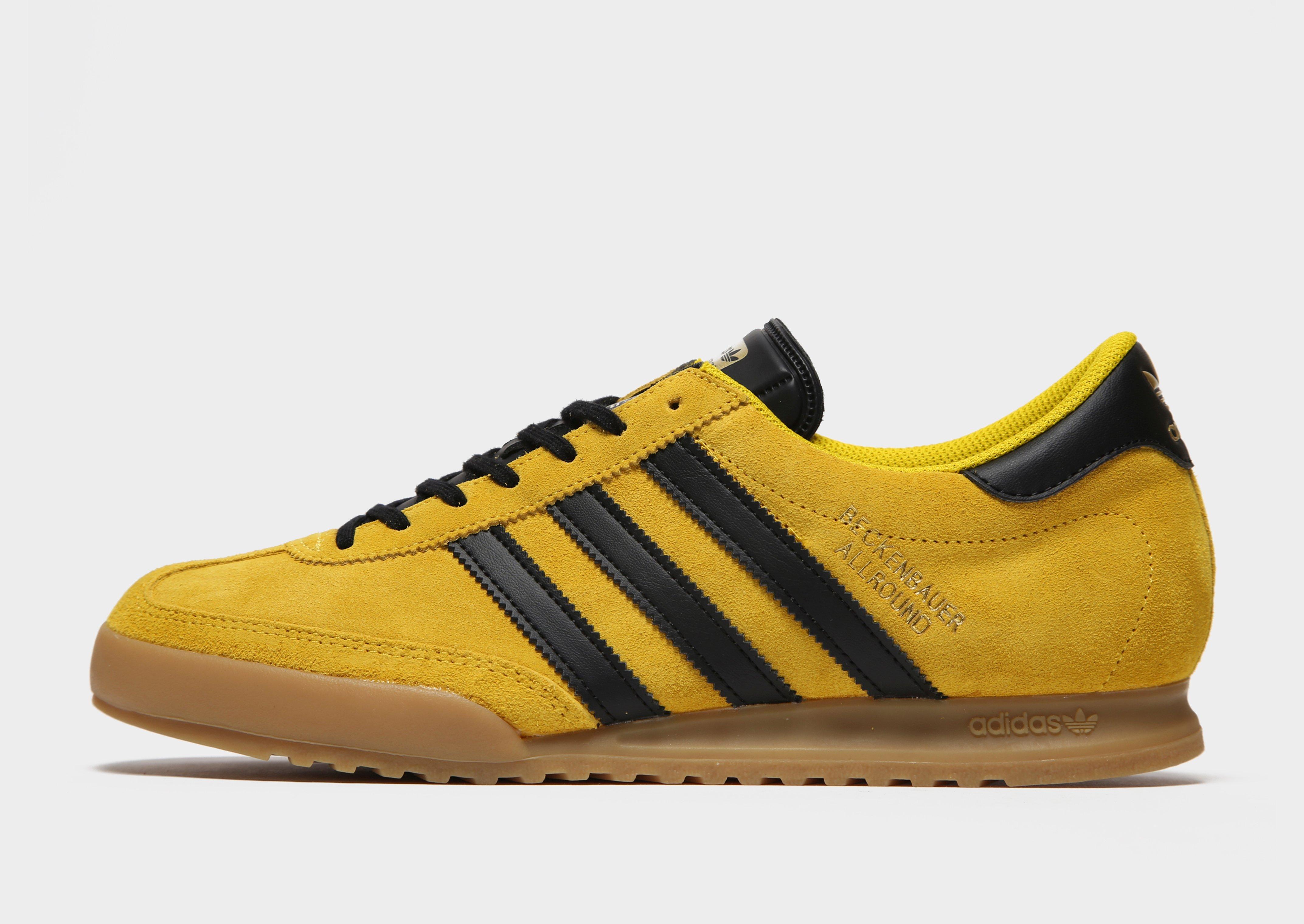 yellow adidas trainers