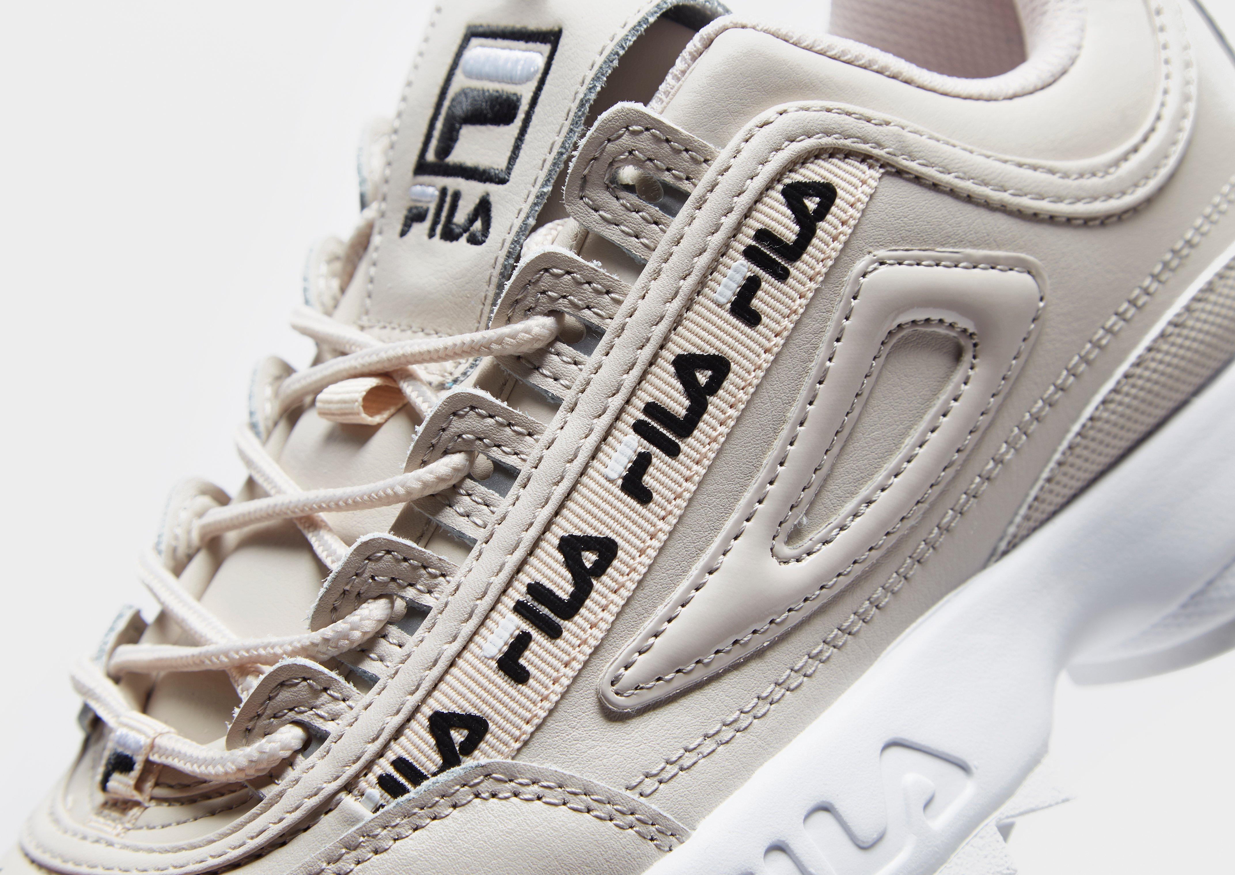 grey and pink fila disruptor