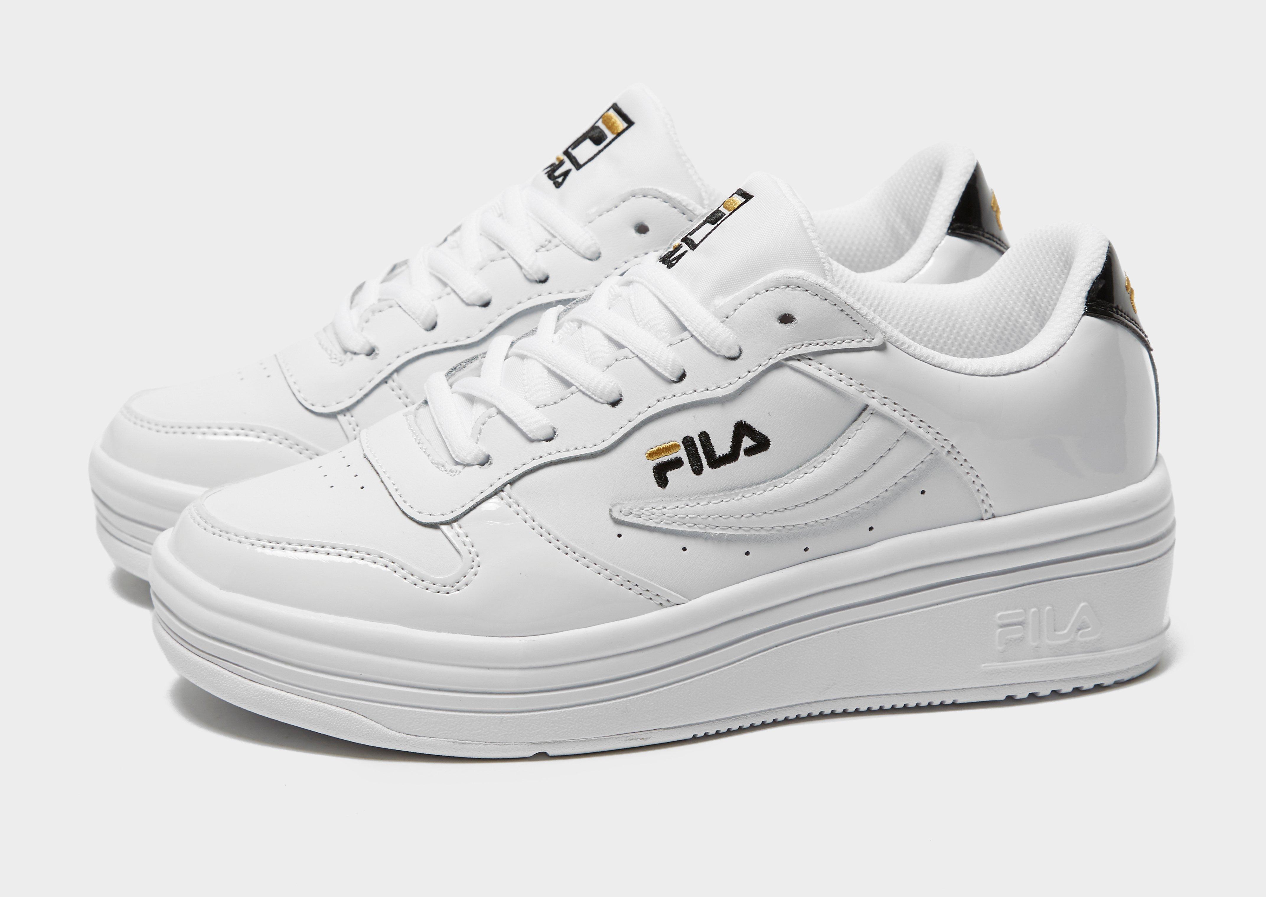 fila black patent trainers