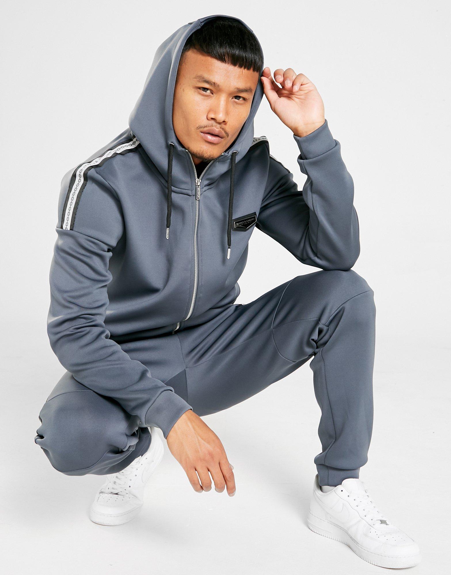 black supply and demand tracksuit