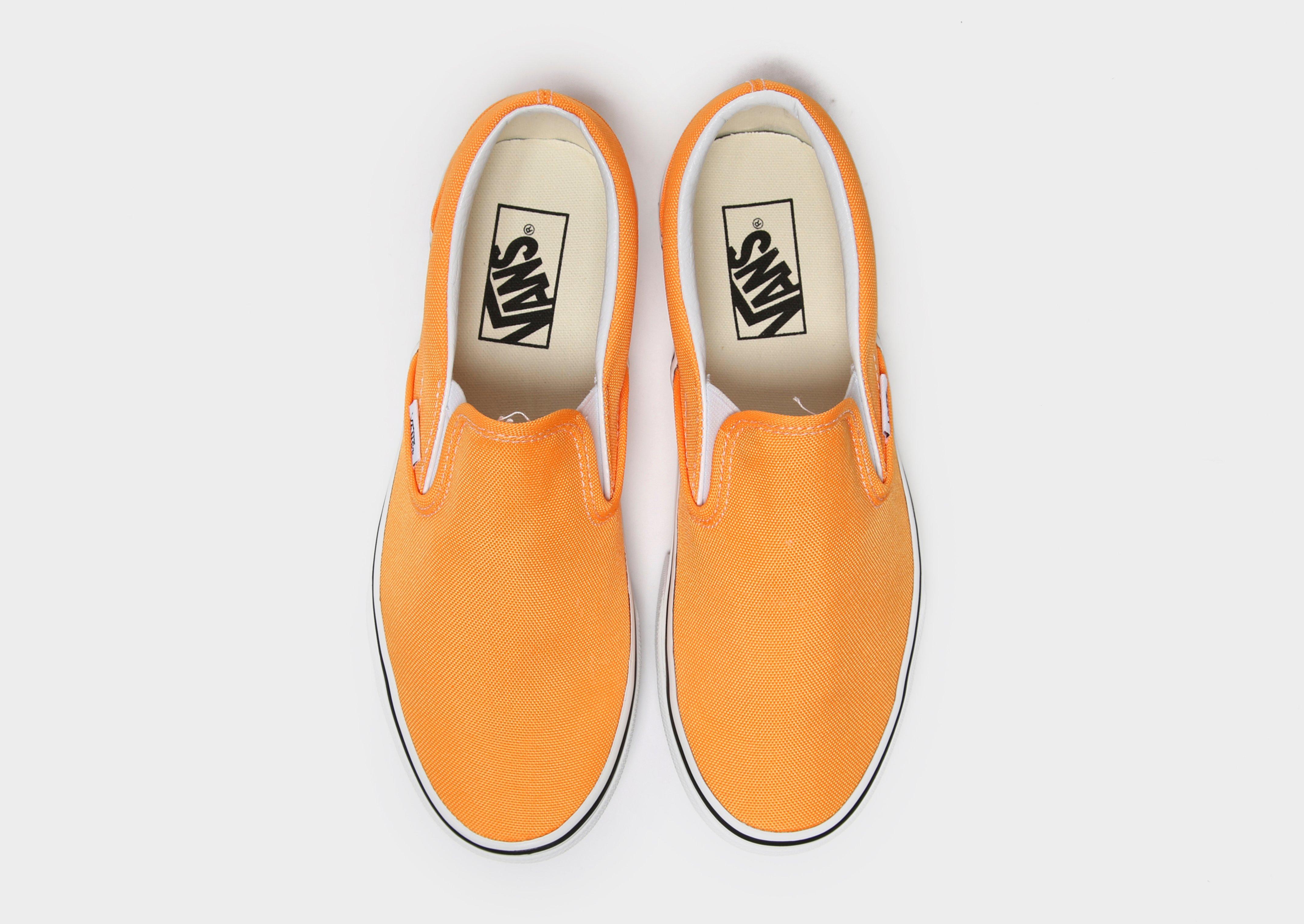 orange slip on vans