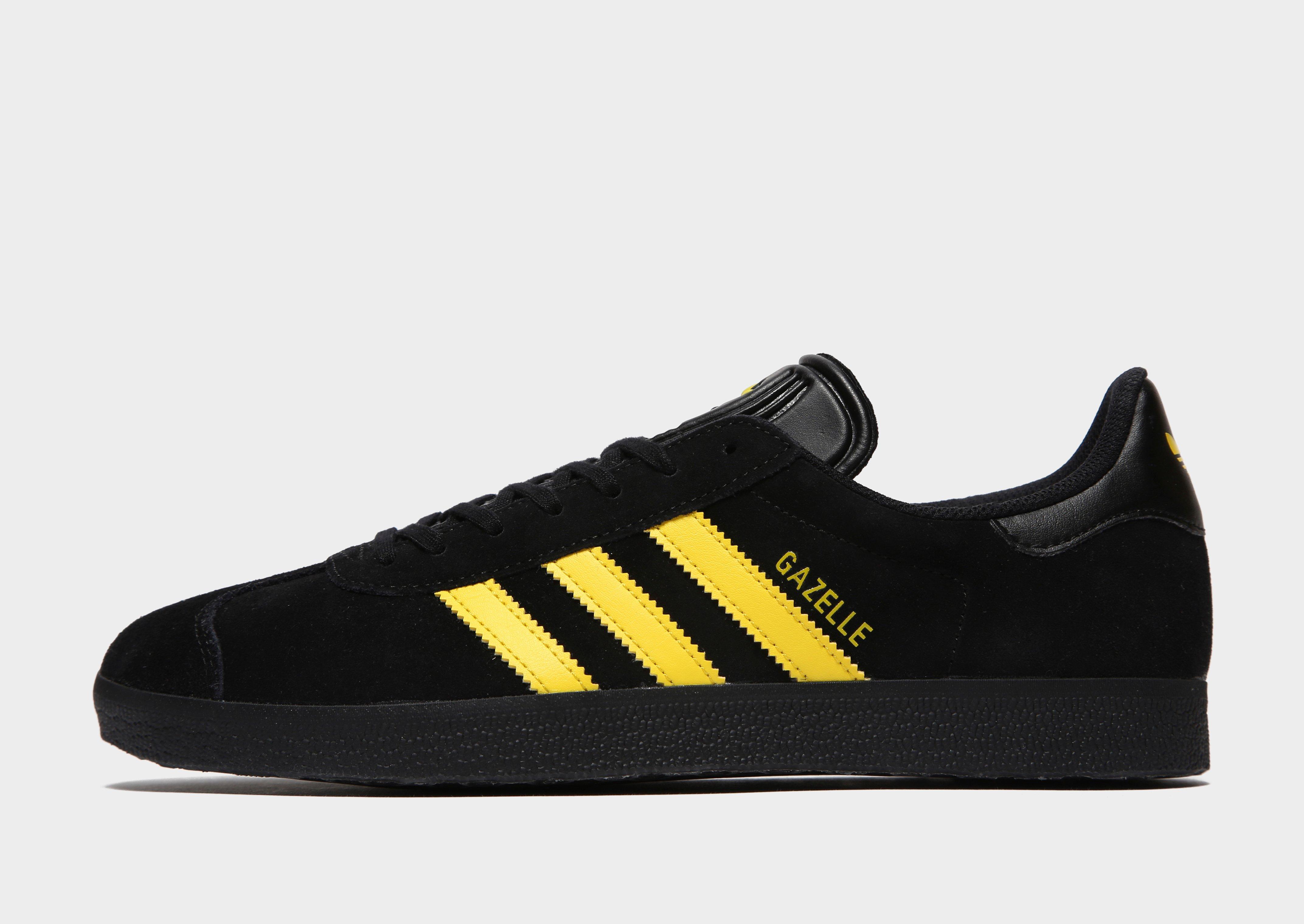 adidas black and yellow trainers
