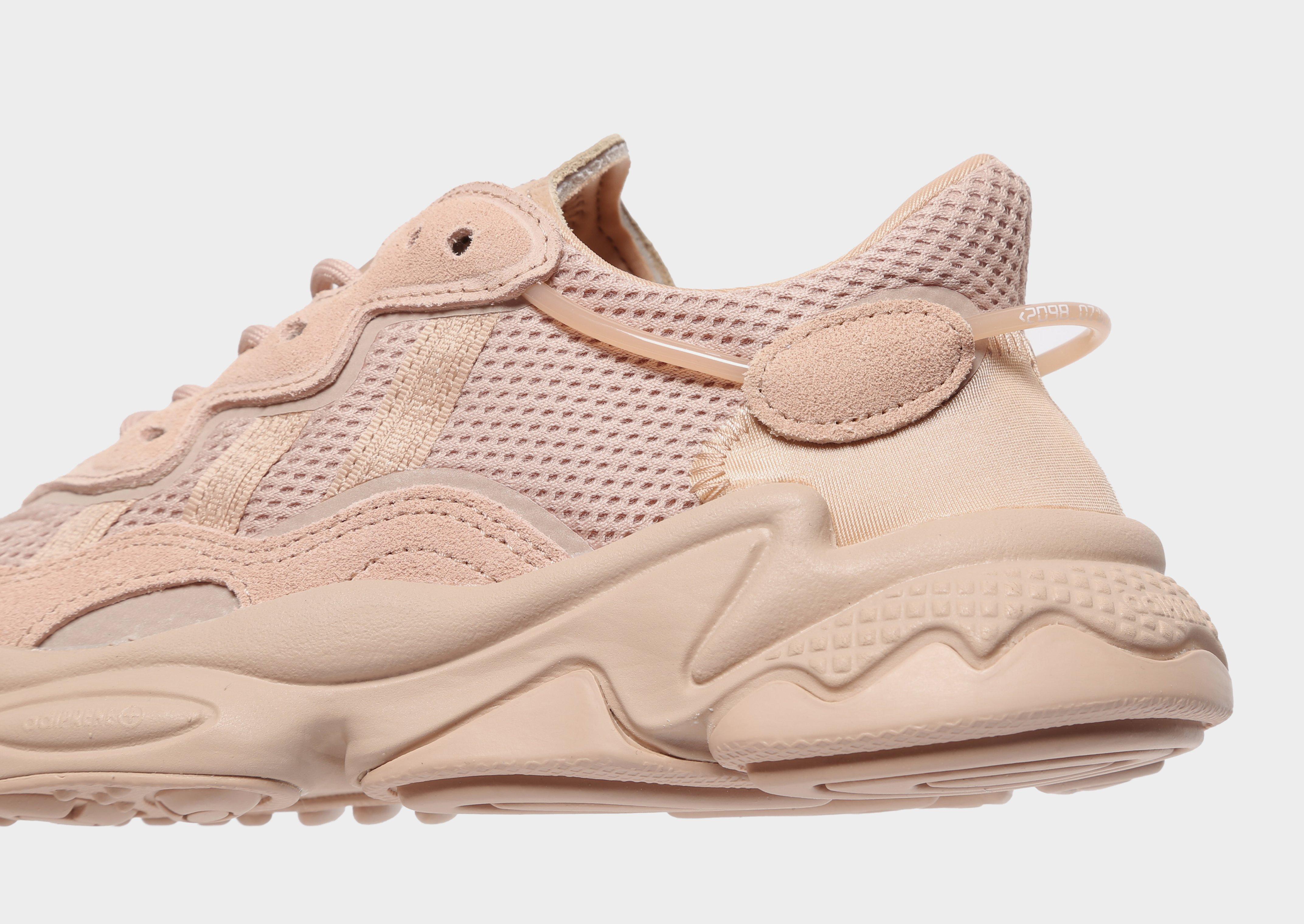 beige ozweego women's