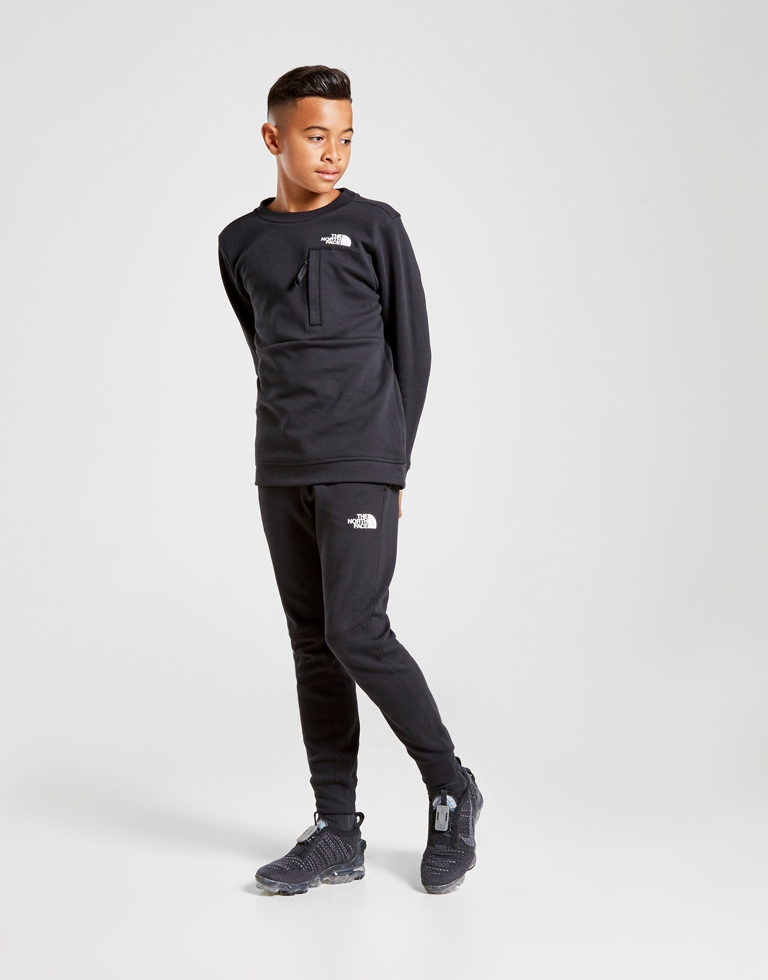 The north face slacker track pants junior hotsell