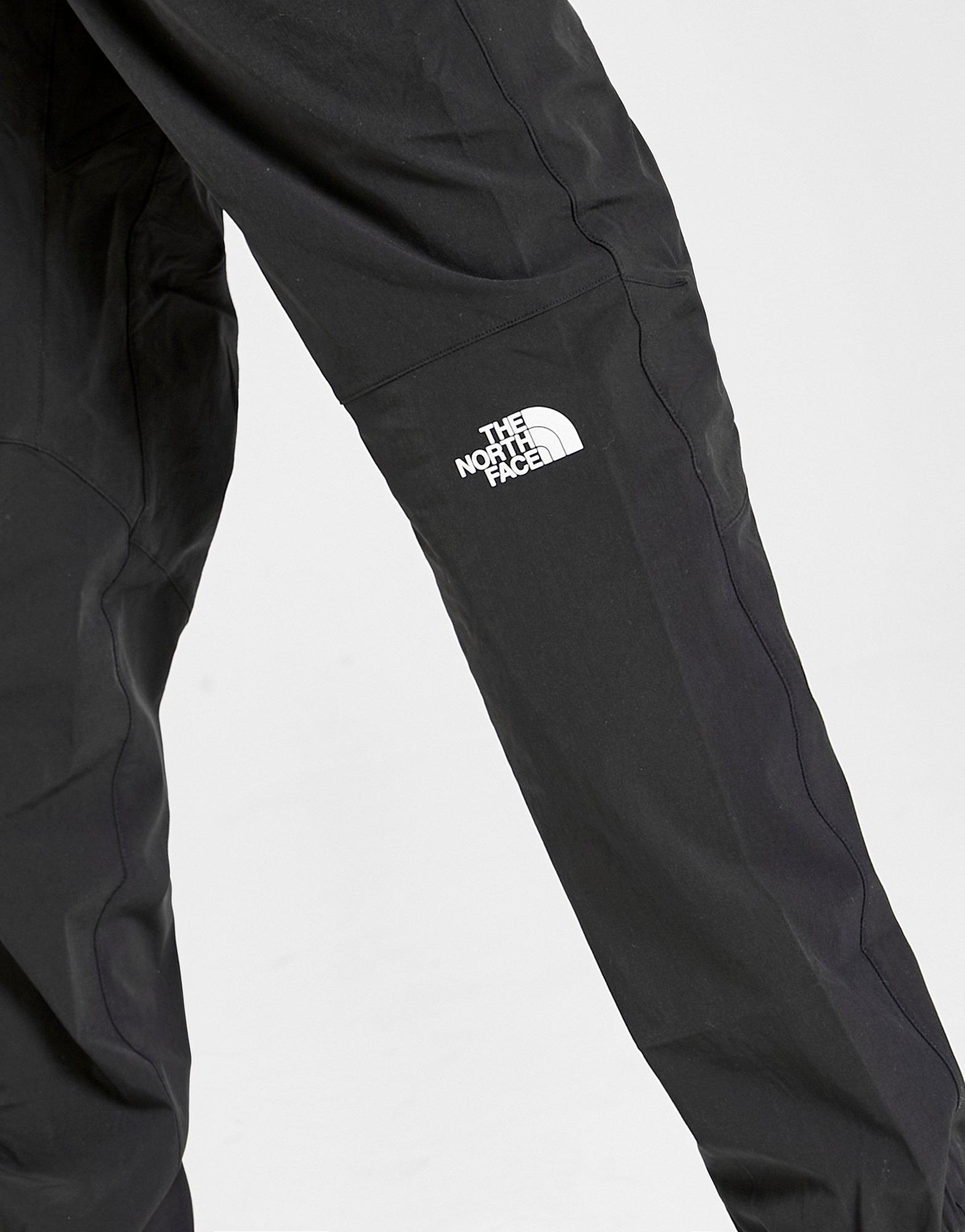 black north face track pants