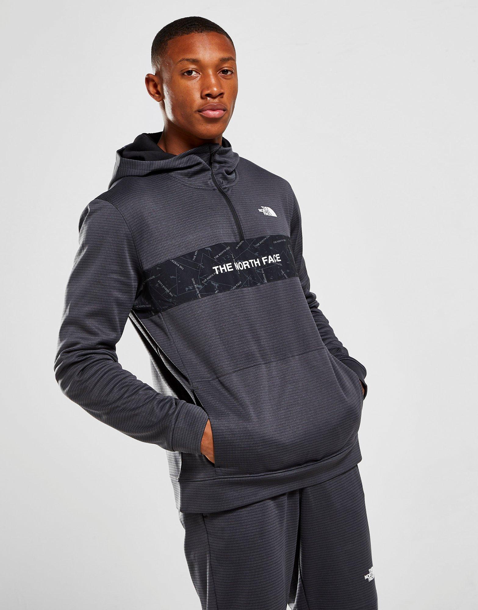 the north face train logo quarter zip pullover hoodie