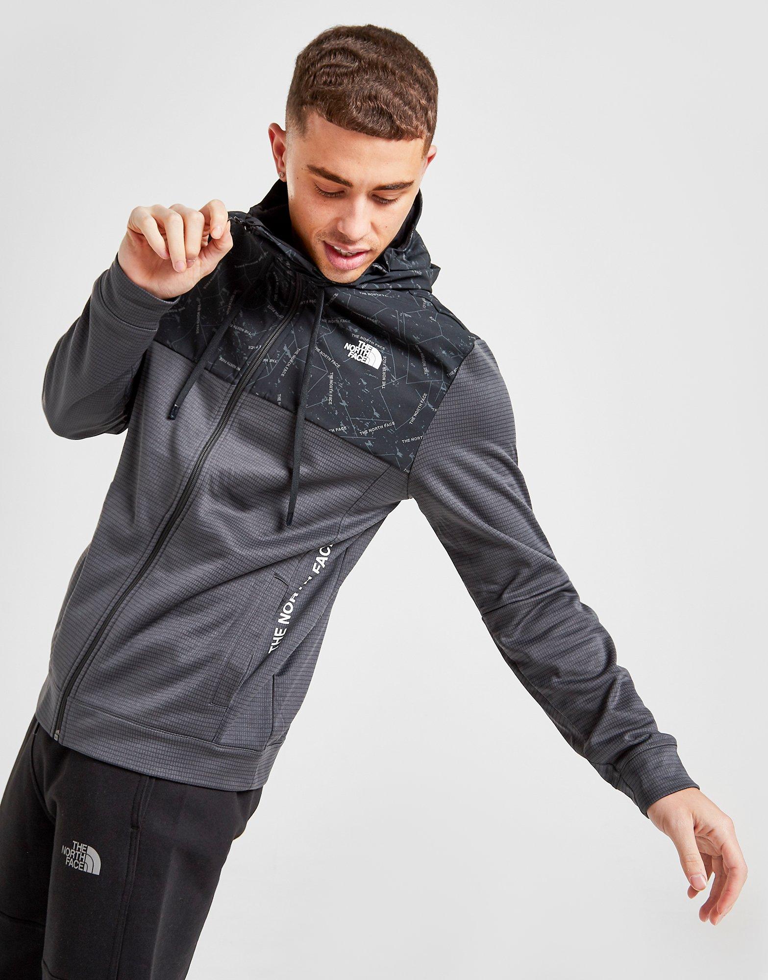 the north face men's train n logo overlay jacket