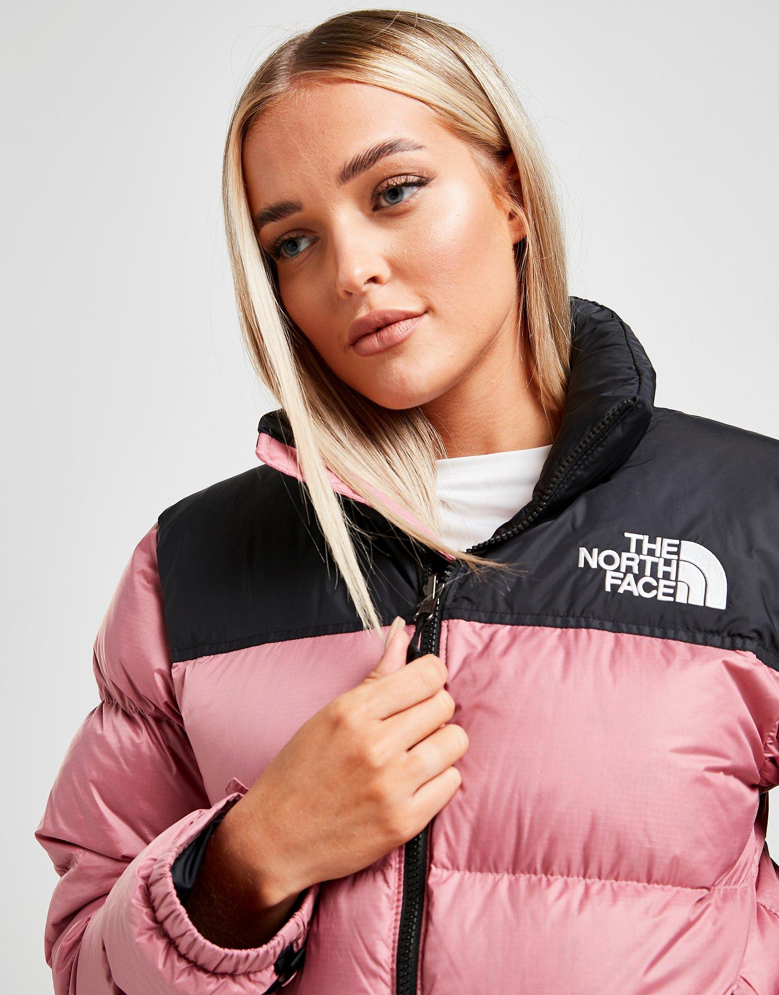 pink and grey north face jacket