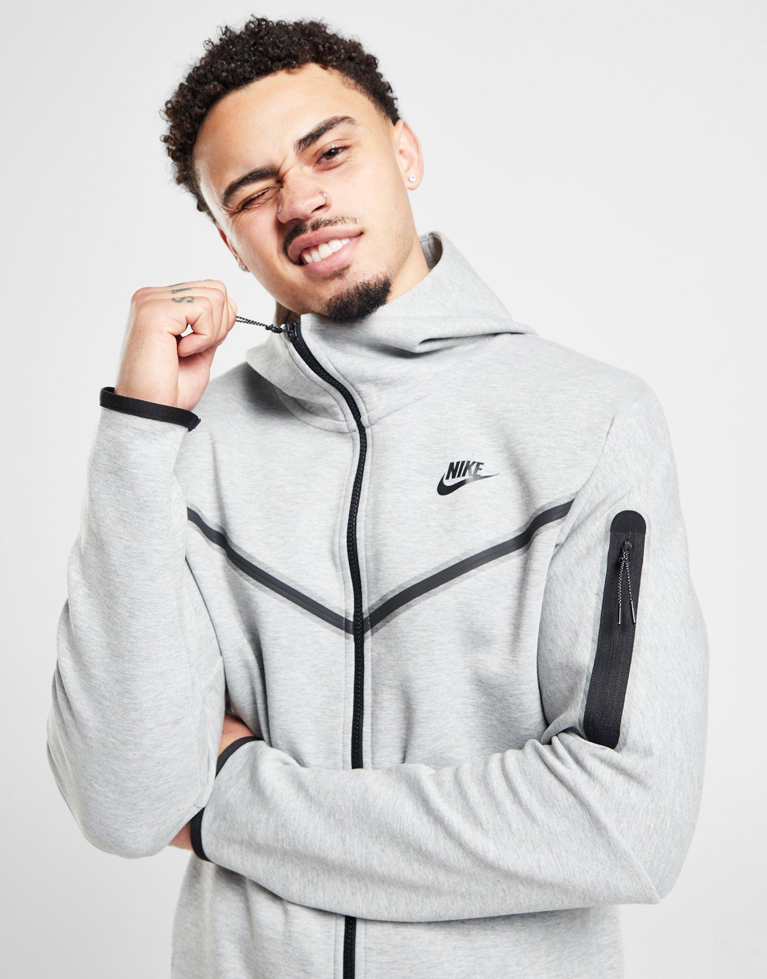 grey nike tech jumper